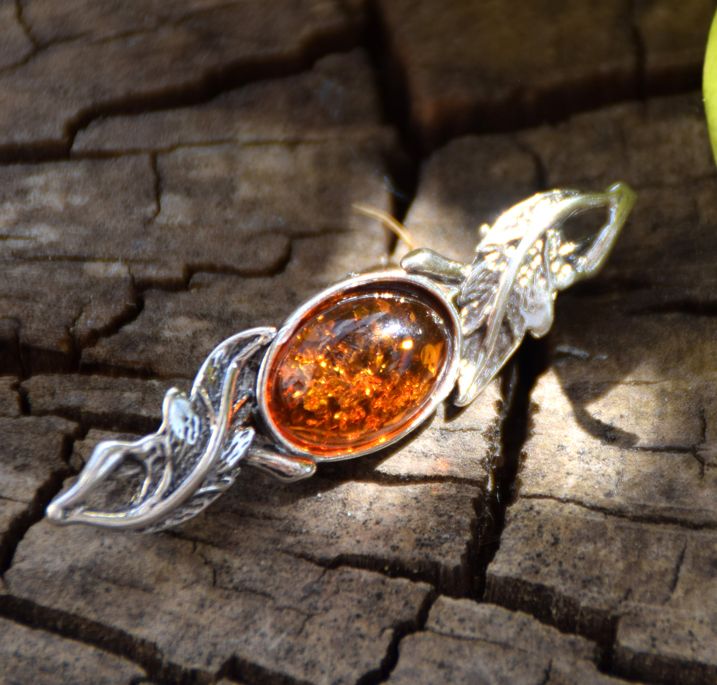 Vintage-style floral design brooch crafted with natural cognac amber and 925 silver, MJ Baltica, BBR017