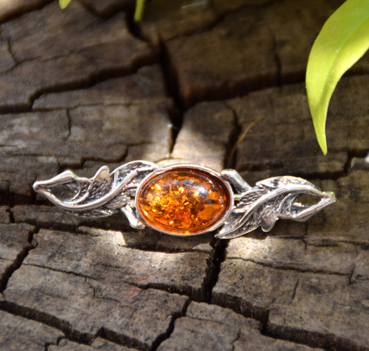 Vintage-style floral design brooch crafted with natural cognac amber and 925 silver, MJ Baltica, BBR017