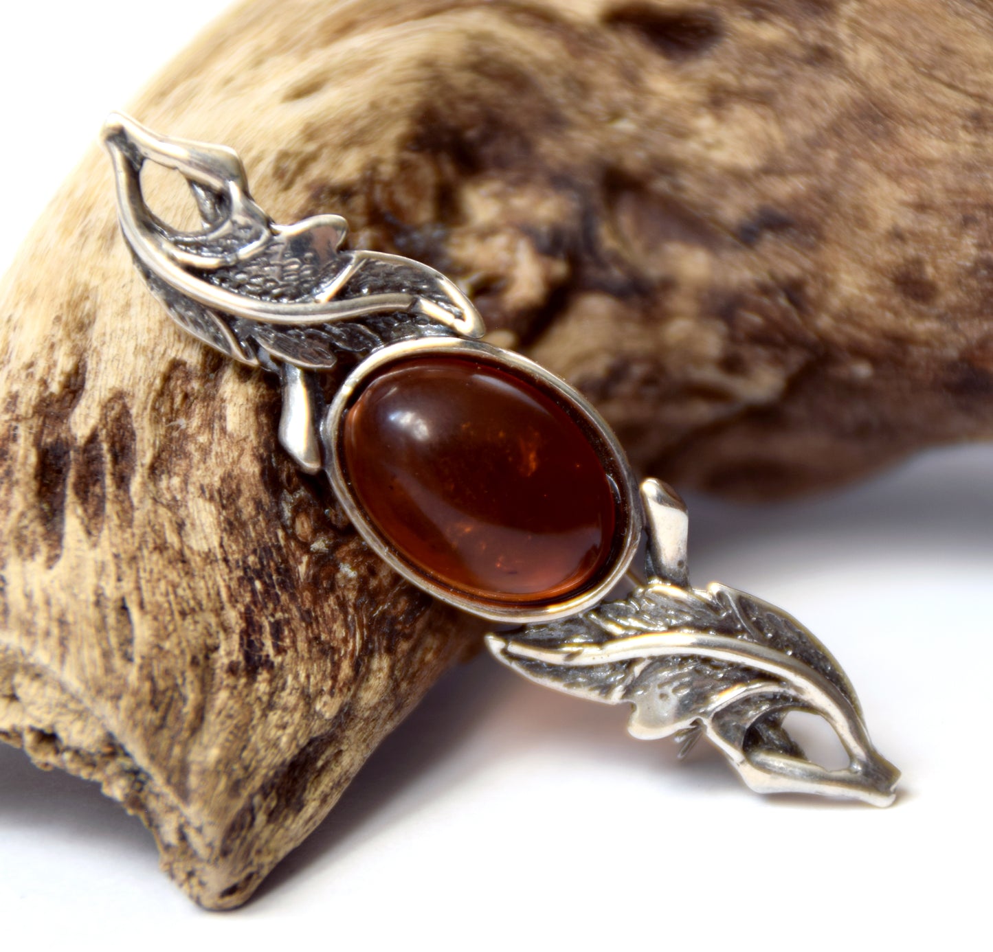 Vintage-style floral design brooch crafted with natural cognac amber and 925 silver, MJ Baltica, BBR017