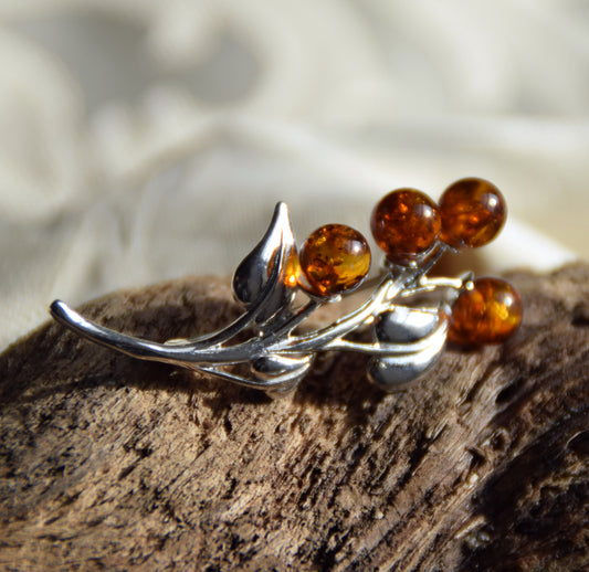 Luminous floral brooch made with natural cognac-colored Amber and 925 Silver, MJ Baltica, BBR018
