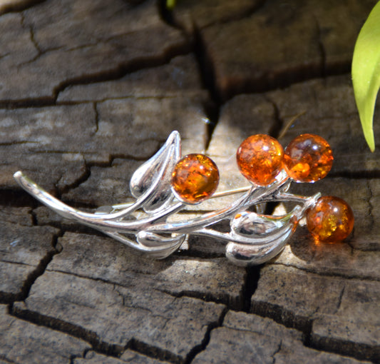 Luminous floral brooch made with natural cognac-colored Amber and 925 Silver, MJ Baltica, BBR018