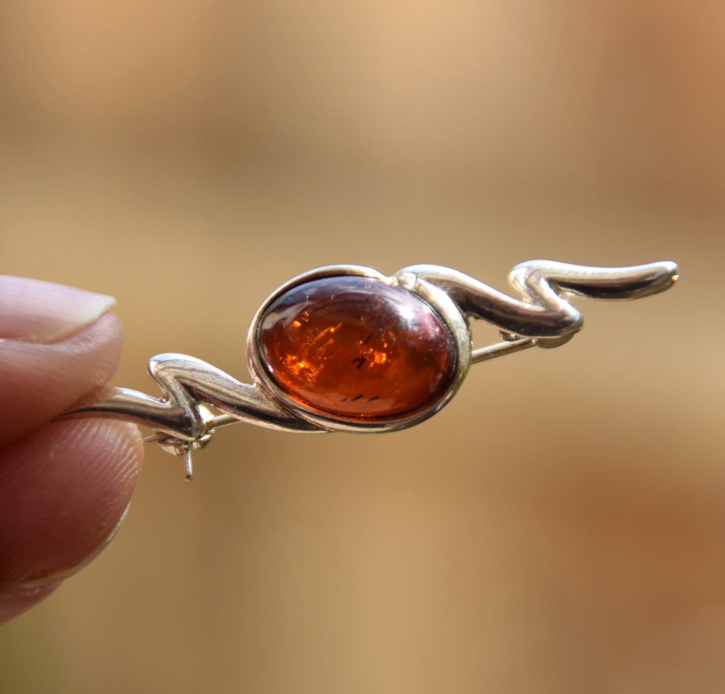 Bright brooch made with dark brown natural Amber and 925 Silver, MJ Baltica, BBR047