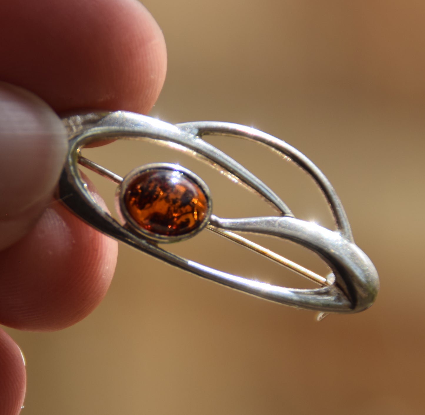 Delicate Art Nouveau brooch created with dark brown natural amber and 925 Silver, MJ Baltica, BBR048