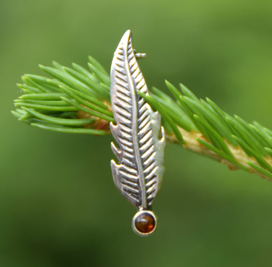 Delicate feather brooch made with natural cognac-colored amber and 925 silver, MJ Baltica, BBR050