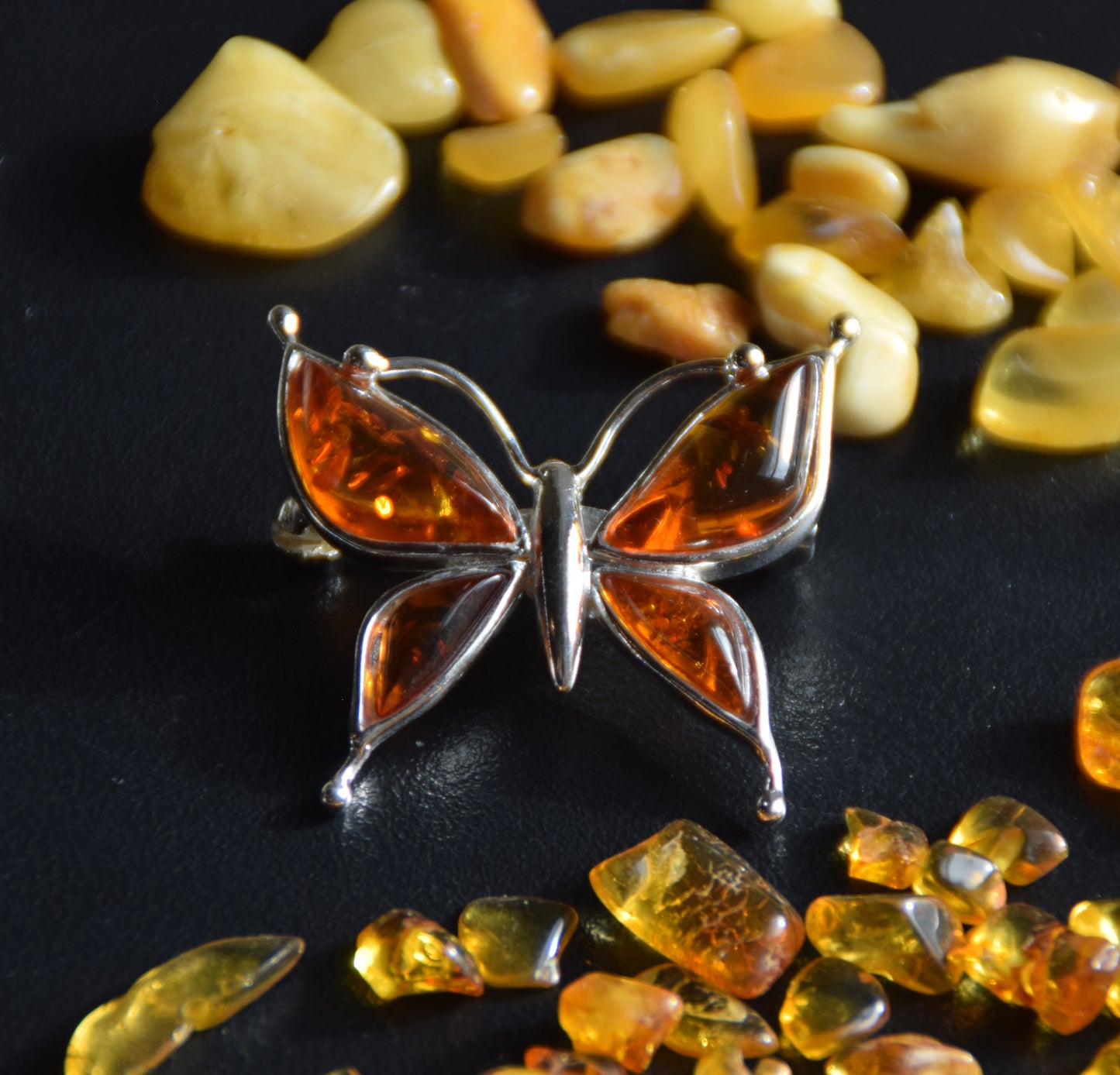 Bright butterfly brooch made with natural cognac Amber and 925 Silver, MJ Baltica, BBR056