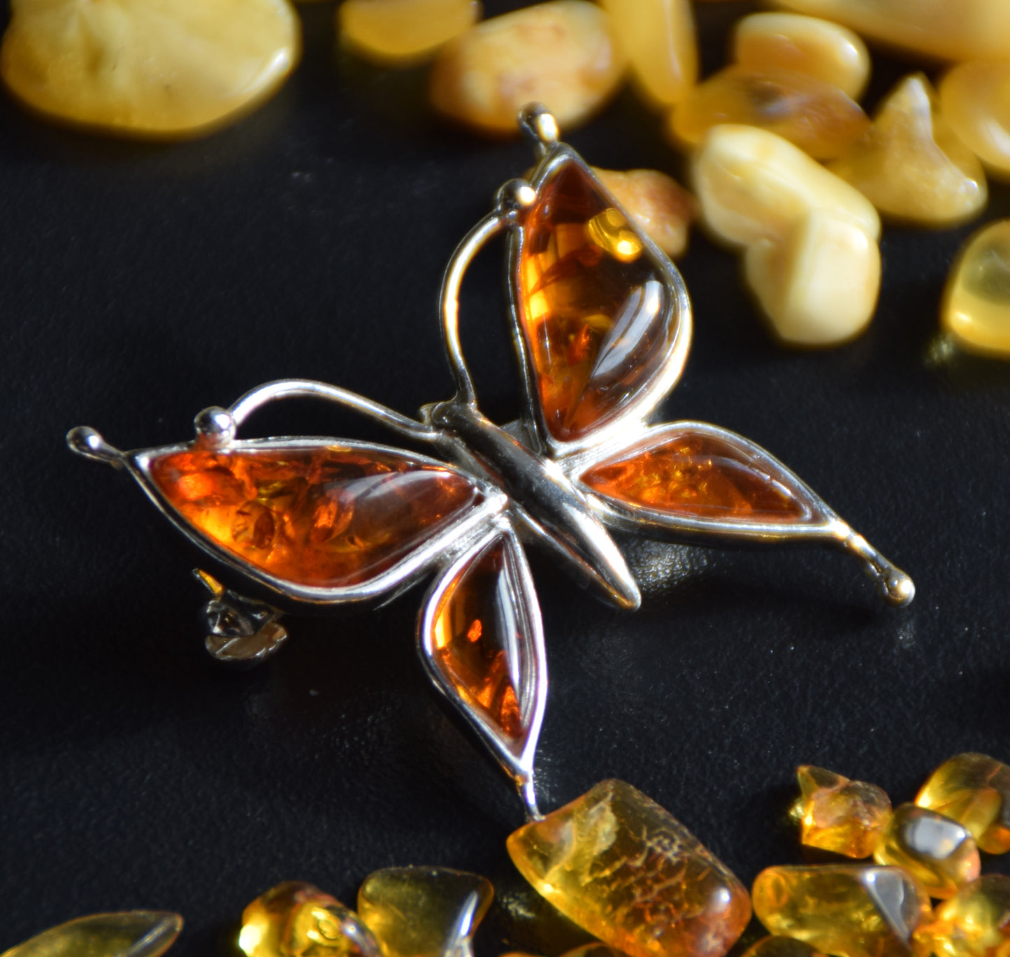 Bright butterfly brooch made with natural cognac Amber and 925 Silver, MJ Baltica, BBR056