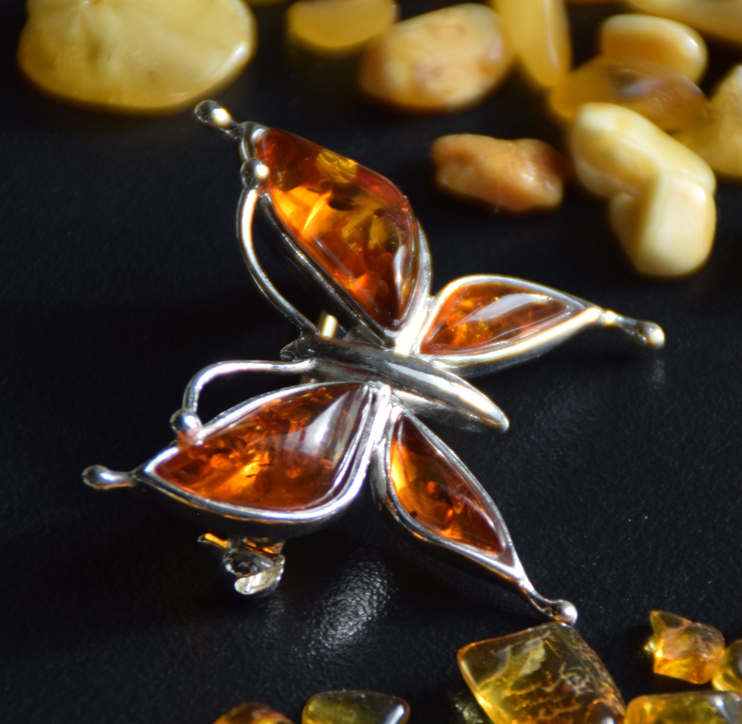 Bright butterfly brooch made with natural cognac Amber and 925 Silver, MJ Baltica, BBR056