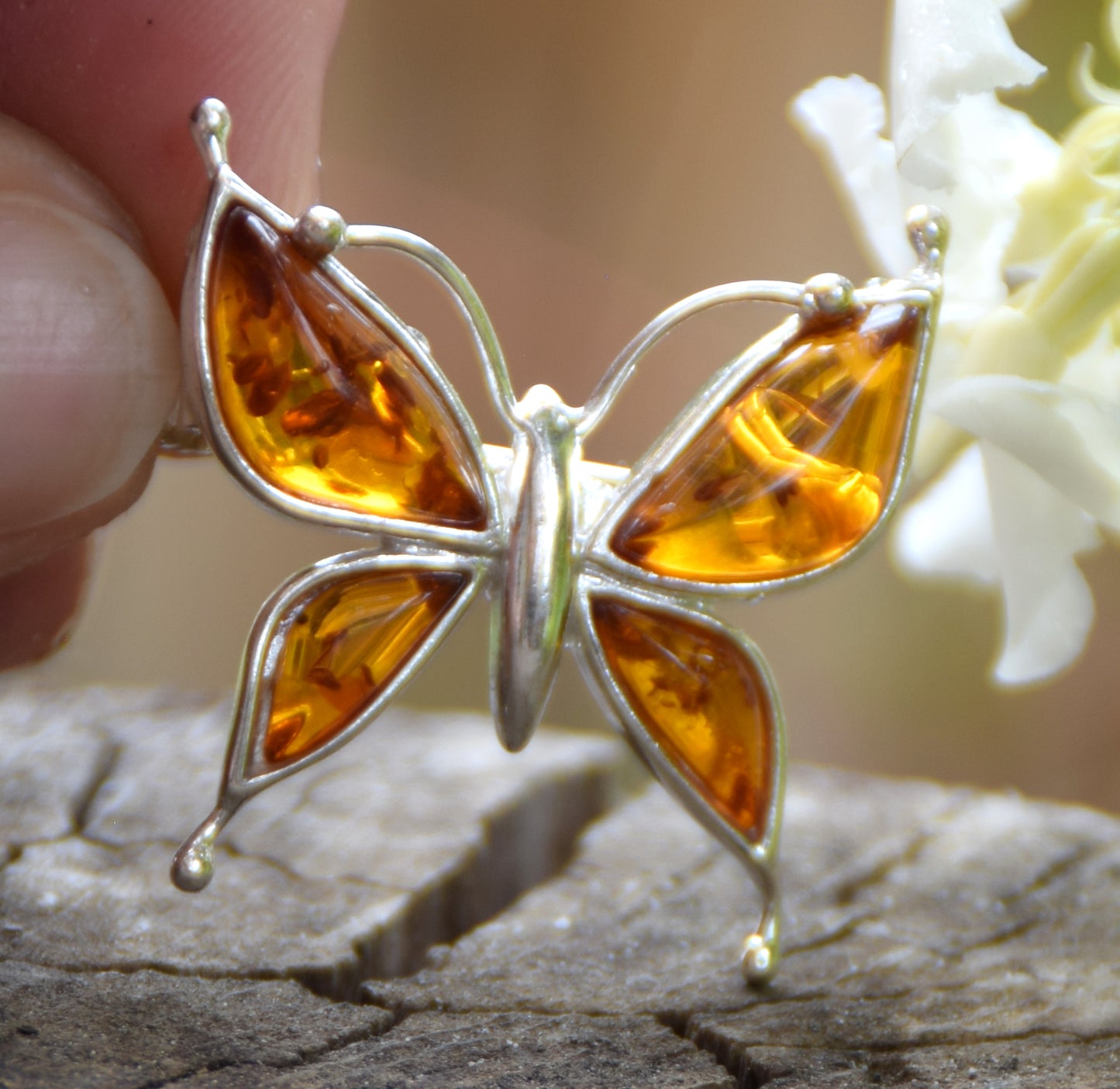 Bright butterfly brooch made with natural cognac Amber and 925 Silver, MJ Baltica, BBR056