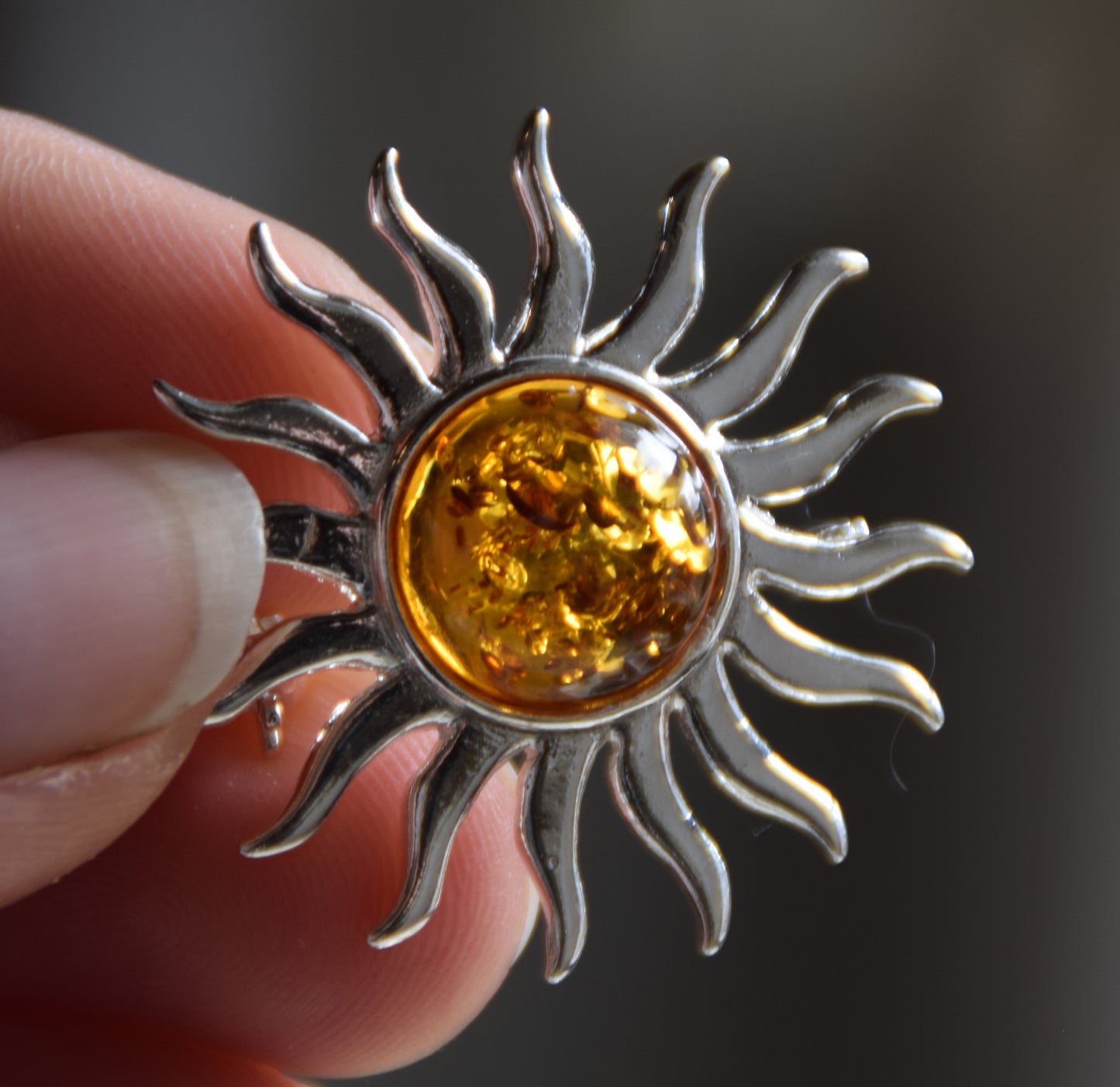 Bright sun-shaped brooch made with natural cognac-colored Amber and 925 Silver, MJ Baltica, BBR057