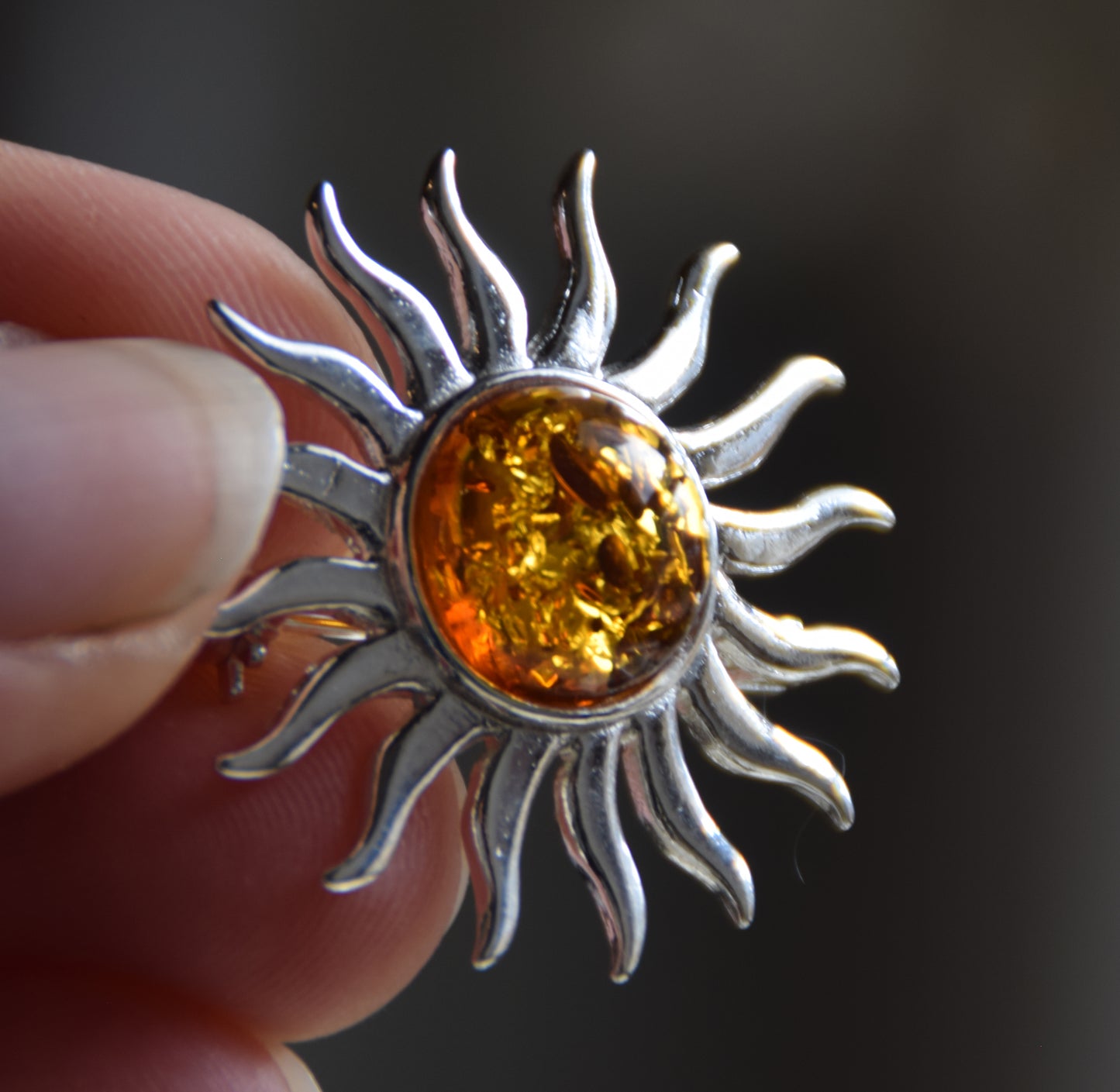 Bright sun-shaped brooch made with natural cognac-colored Amber and 925 Silver, MJ Baltica, BBR057