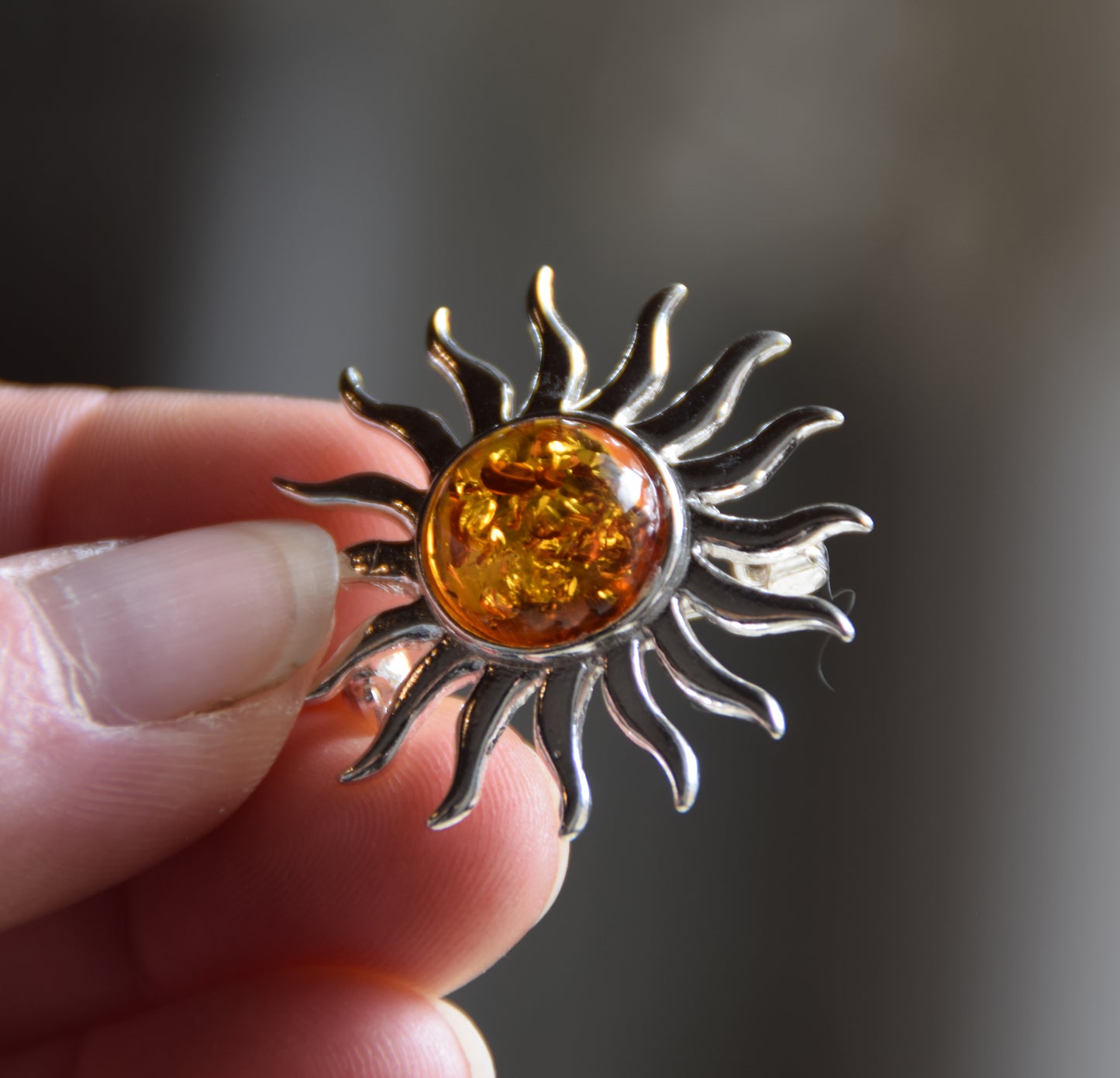 Bright sun-shaped brooch made with natural cognac-colored Amber and 925 Silver, MJ Baltica, BBR057