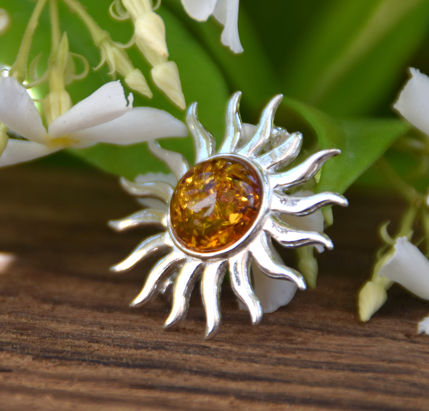 Bright sun-shaped brooch made with natural cognac-colored Amber and 925 Silver, MJ Baltica, BBR057