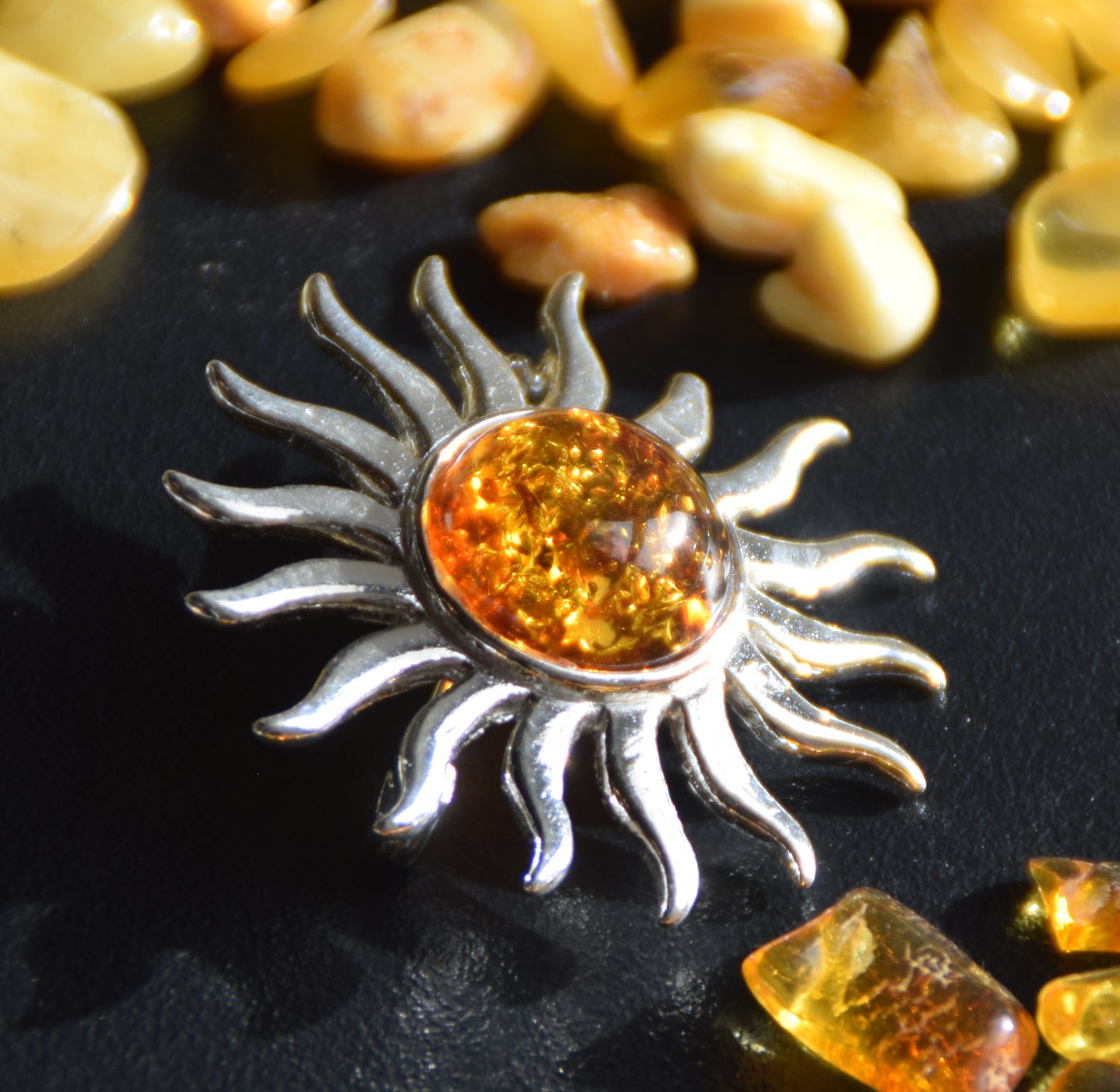 Bright sun-shaped brooch made with natural cognac-colored Amber and 925 Silver, MJ Baltica, BBR057