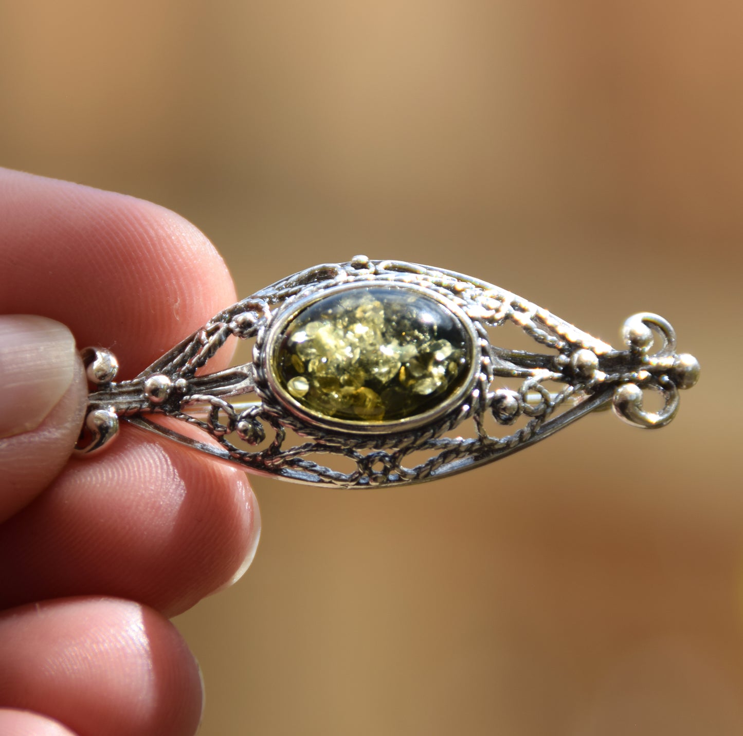 Vintage brooch with filigree design created with natural green Amber and 925 Sterling Silver, MJ Baltica, BBR061