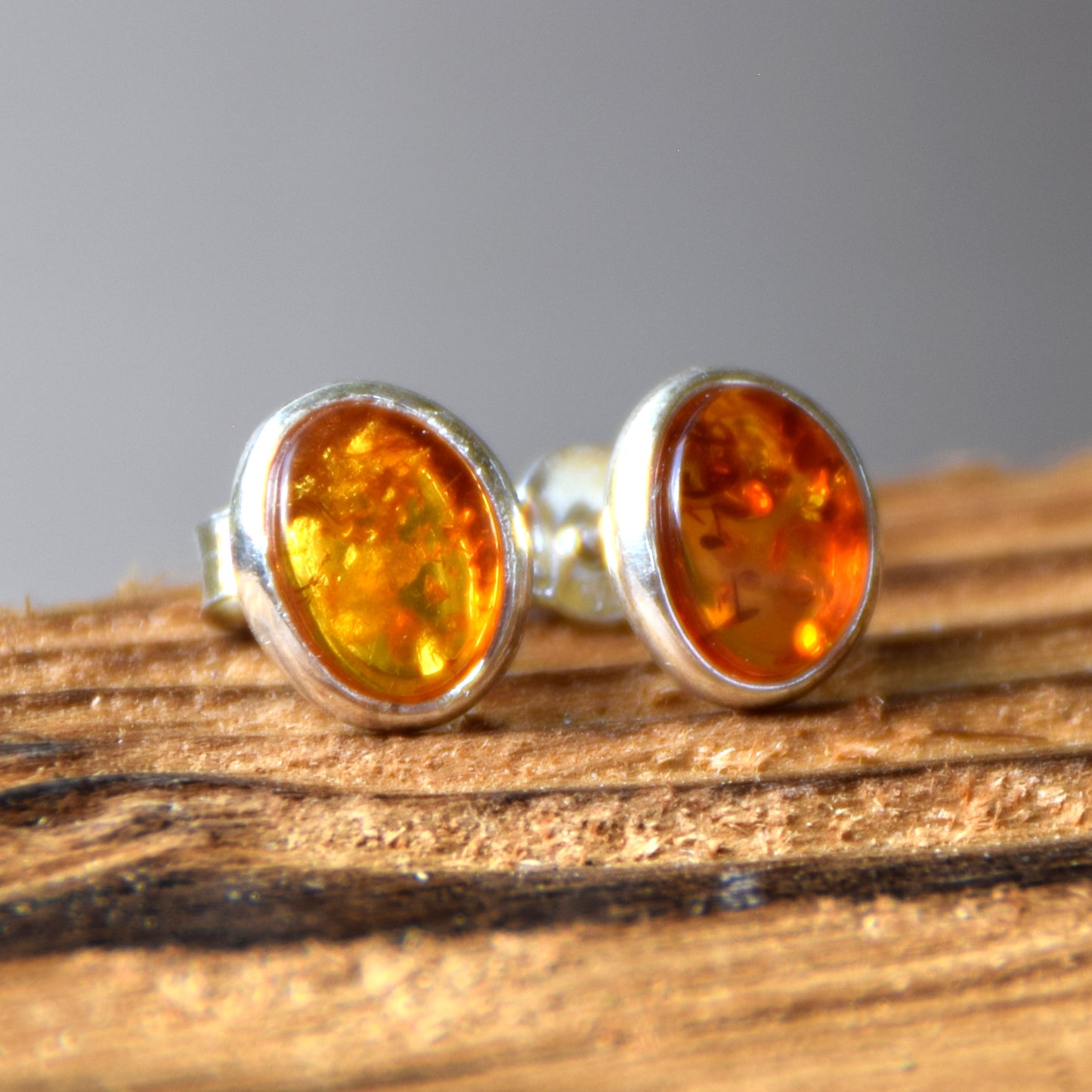 Oval stud earrings with natural Cognac Amber and set in Sterling Silver 925, MJ Baltica, BK003