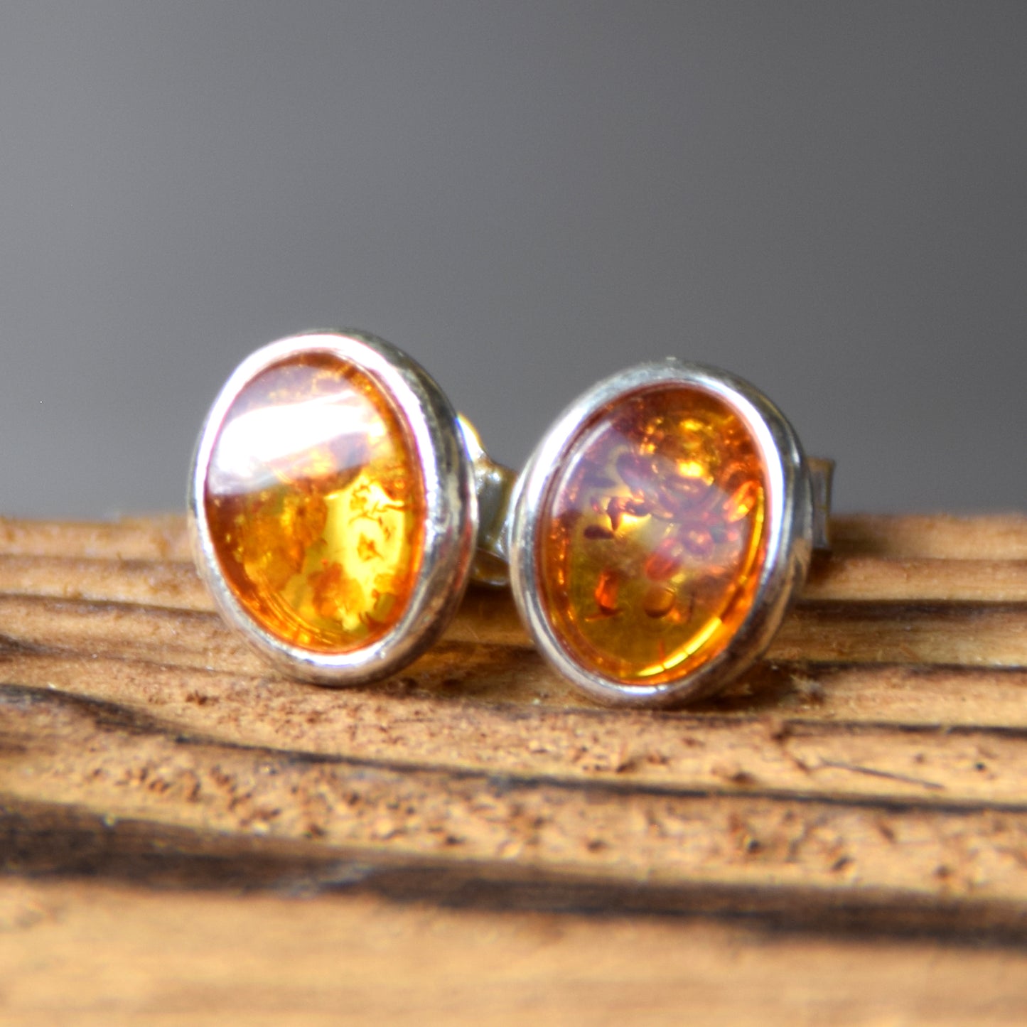 Oval stud earrings with natural Cognac Amber and set in Sterling Silver 925, MJ Baltica, BK003