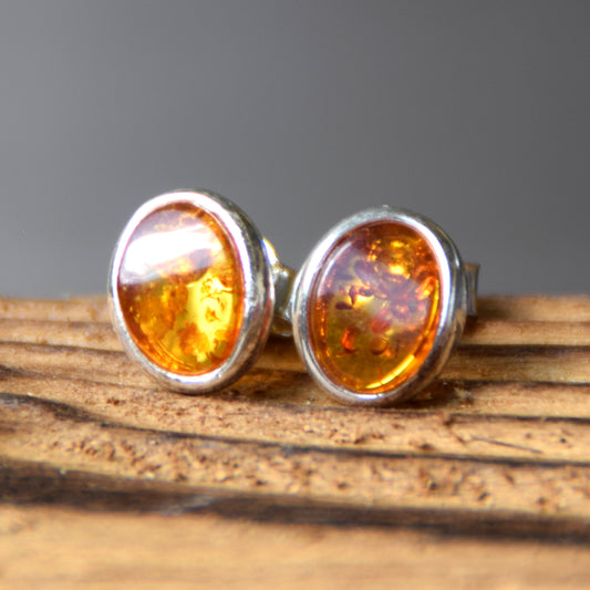 Oval stud earrings with natural Cognac Amber and set in Sterling Silver 925, MJ Baltica, BK003
