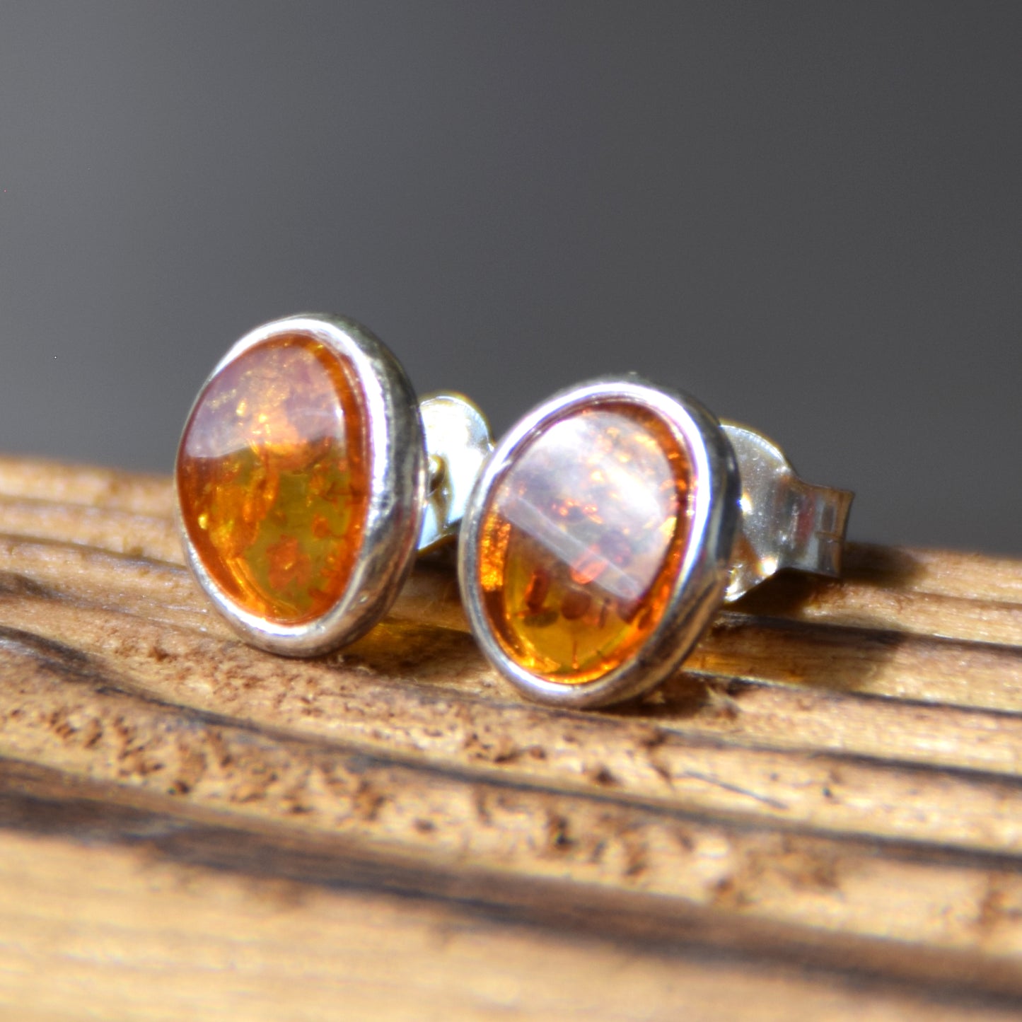 Oval stud earrings with natural Cognac Amber and set in Sterling Silver 925, MJ Baltica, BK003