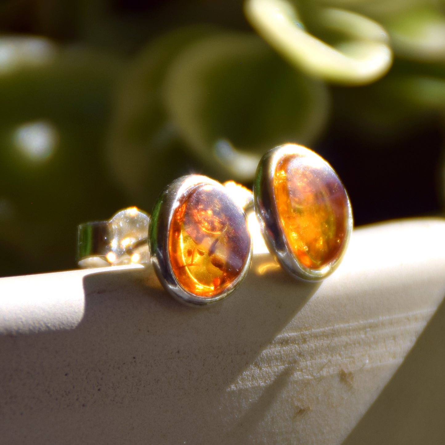 Oval stud earrings with natural Cognac Amber and set in Sterling Silver 925, MJ Baltica, BK003