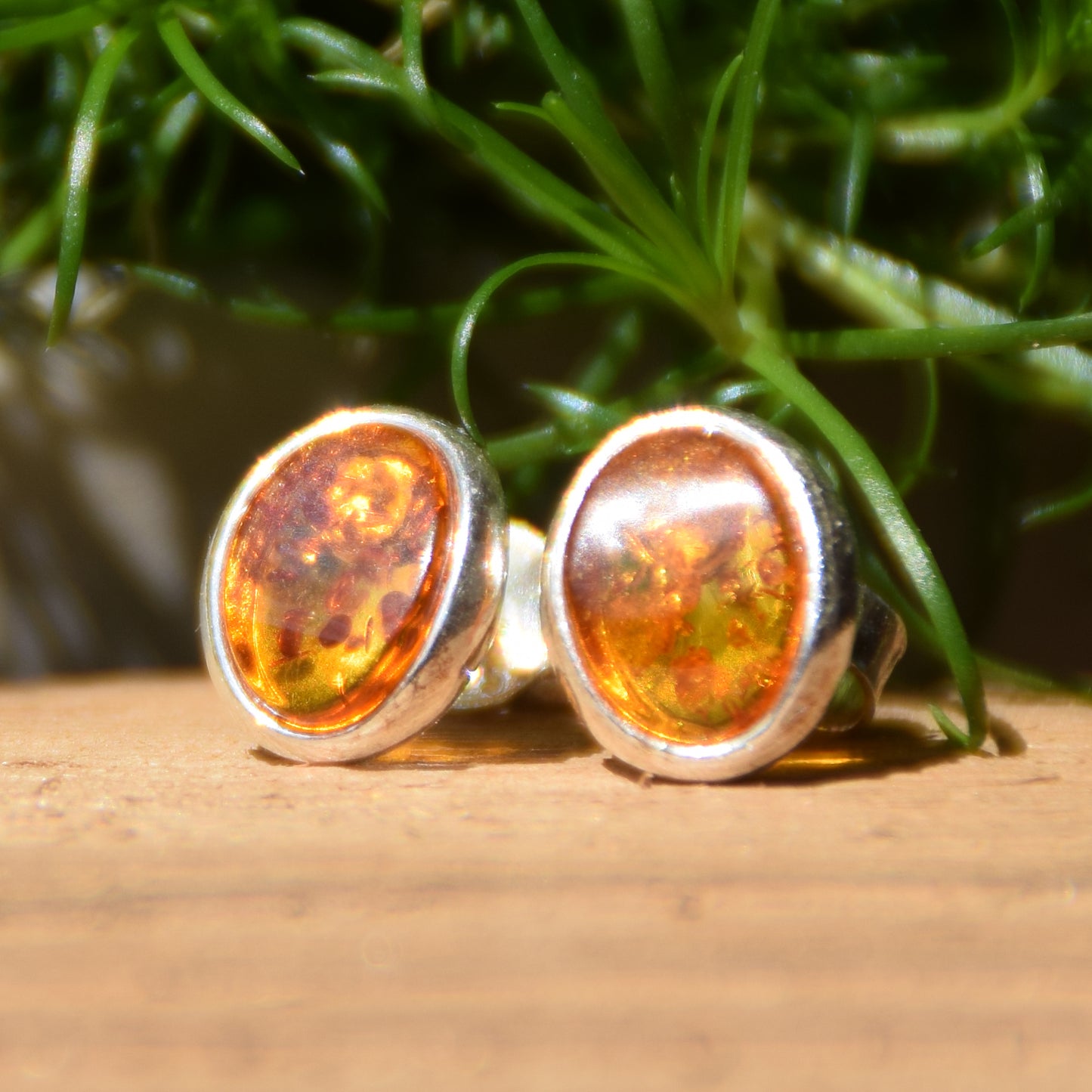 Oval stud earrings with natural Cognac Amber and set in Sterling Silver 925, MJ Baltica, BK003