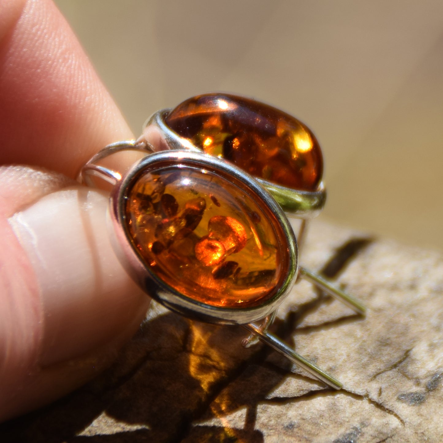 Bright earrings with a leverback closure, made with natural cognac-colored oval Amber and 925 Silver, MJ Baltica, BK047