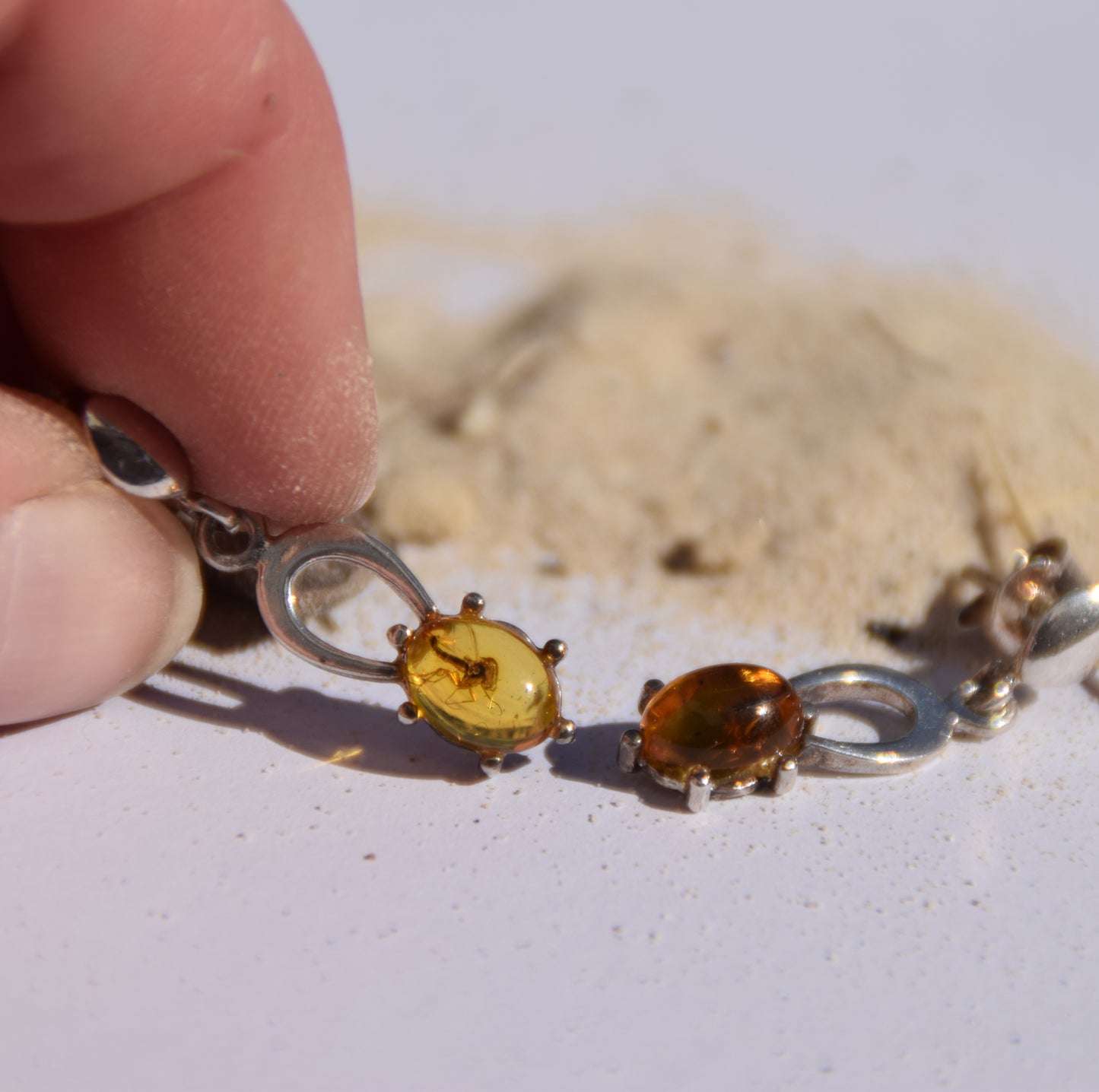 Unique earrings with natural Amber containing fossil inclusions and 925 Silver, MJ Baltica, BK076