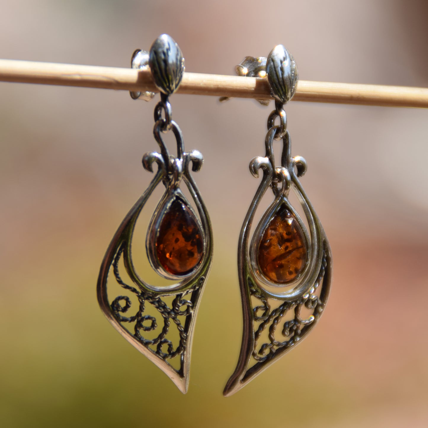 Classic dangle earrings with oriental style filigree with a cognac-colored natural Amber drop and 925 Silver, MJ Baltica, BK100