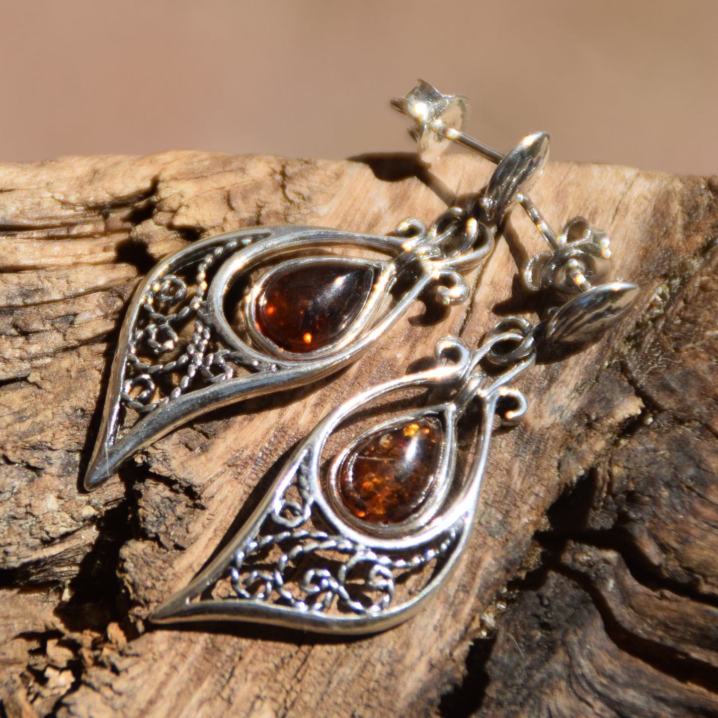 Classic dangle earrings with oriental style filigree with a cognac-colored natural Amber drop and 925 Silver, MJ Baltica, BK100