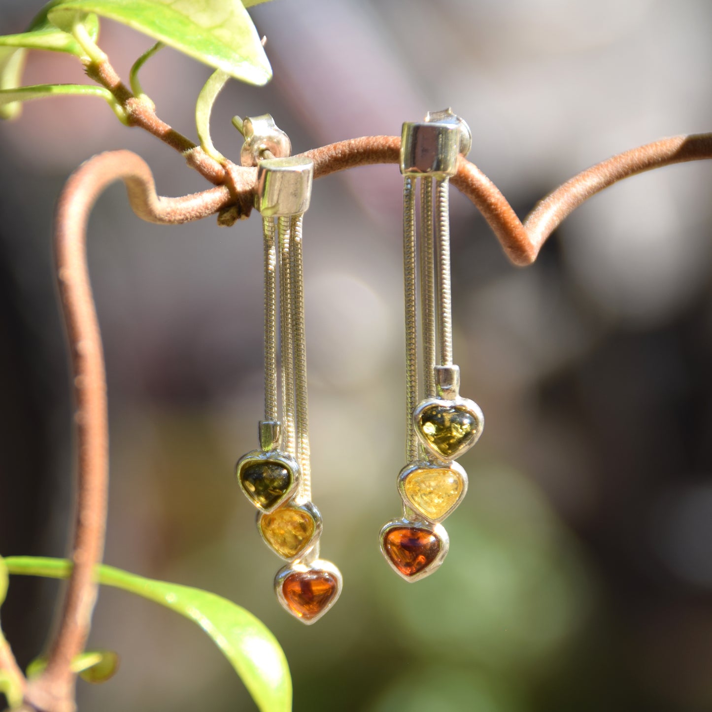 Romantic earrings with three hearts featuring natural amber in various shades and 925 Silver, MJ Baltica, BK152