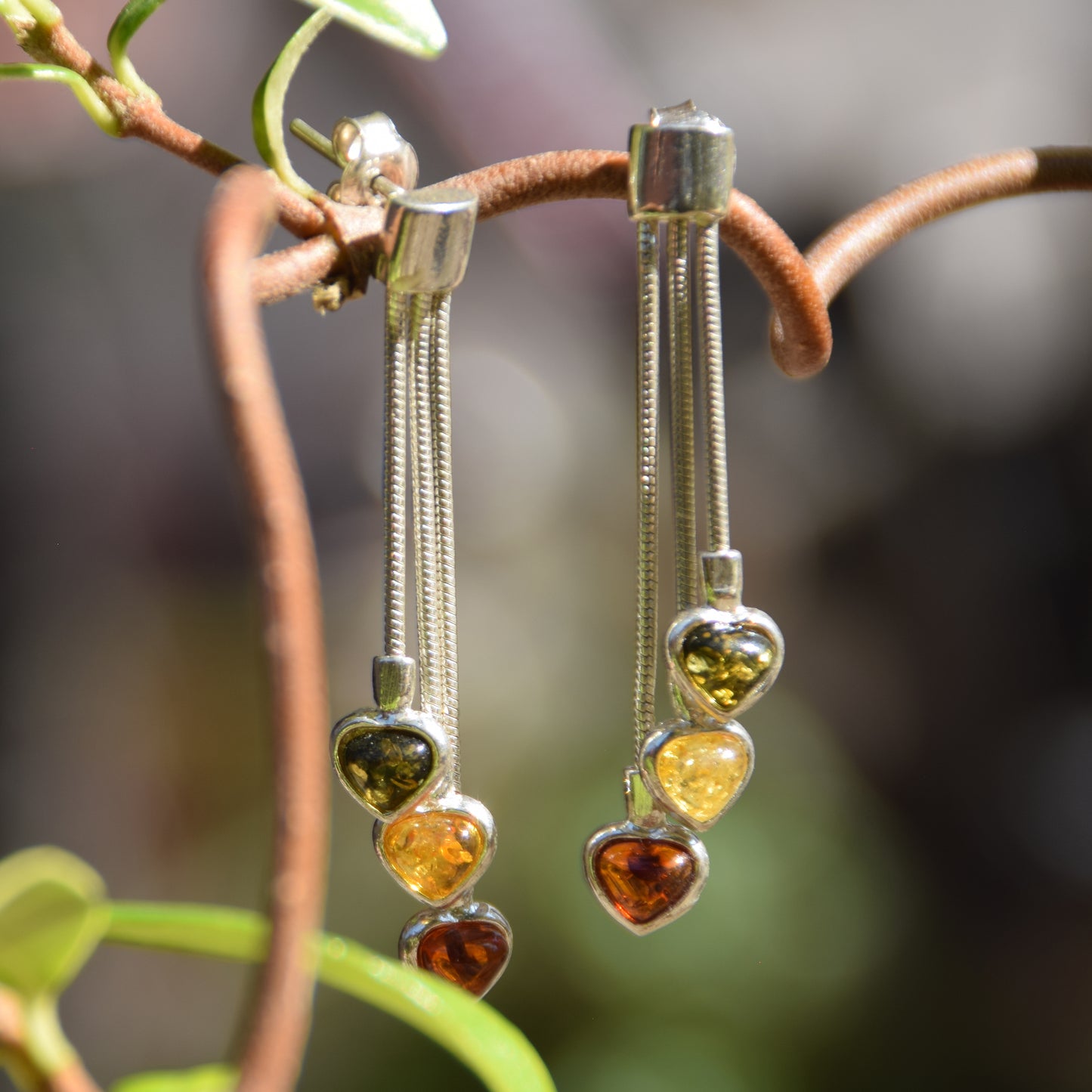 Romantic earrings with three hearts featuring natural amber in various shades and 925 Silver, MJ Baltica, BK152