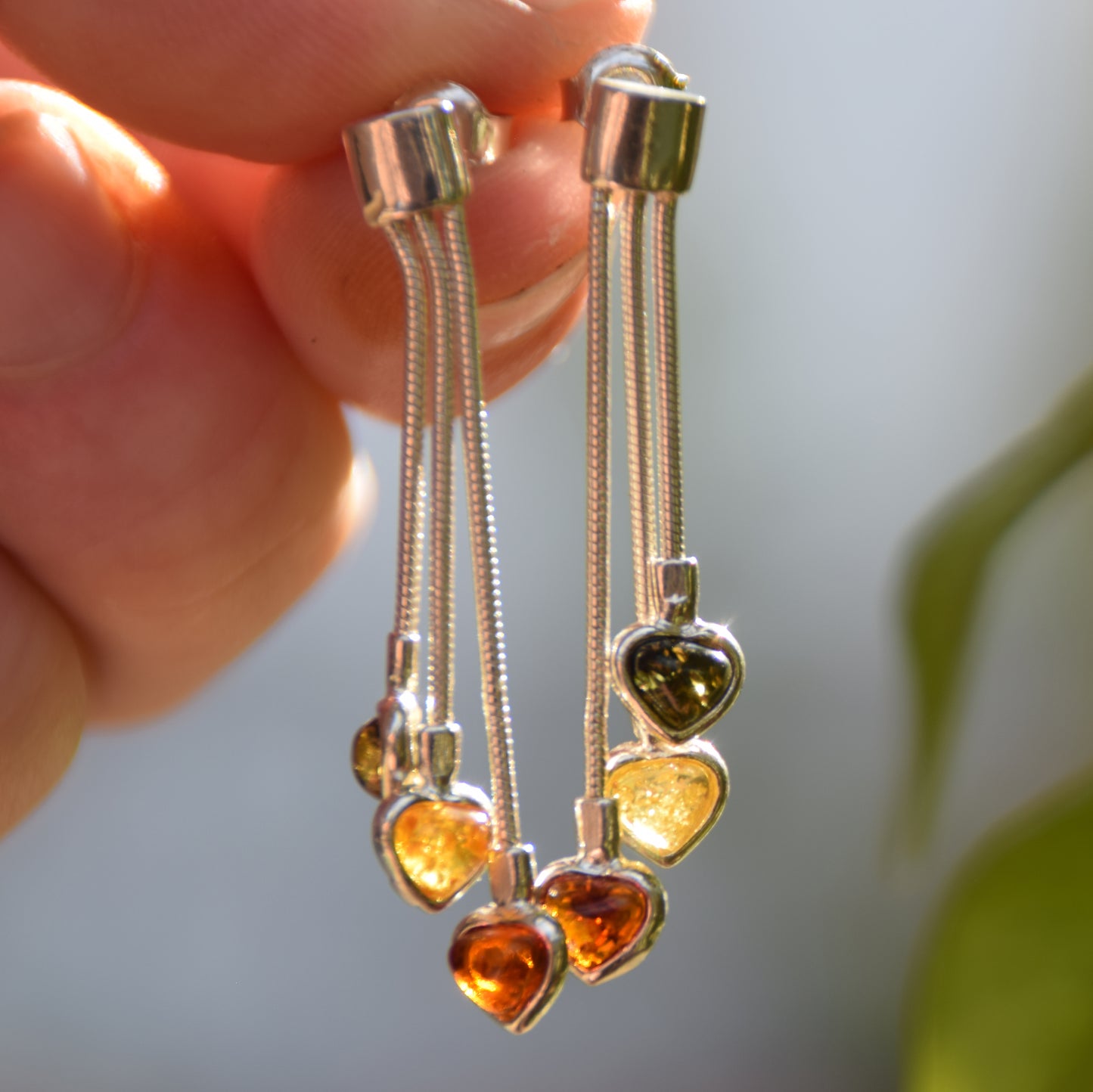 Romantic earrings with three hearts featuring natural amber in various shades and 925 Silver, MJ Baltica, BK152
