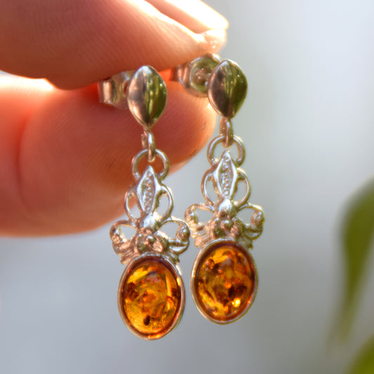Delicate bow earrings made with cognac-colored natural Amber and 925 Sterling Silver, MJ Baltica, BK170