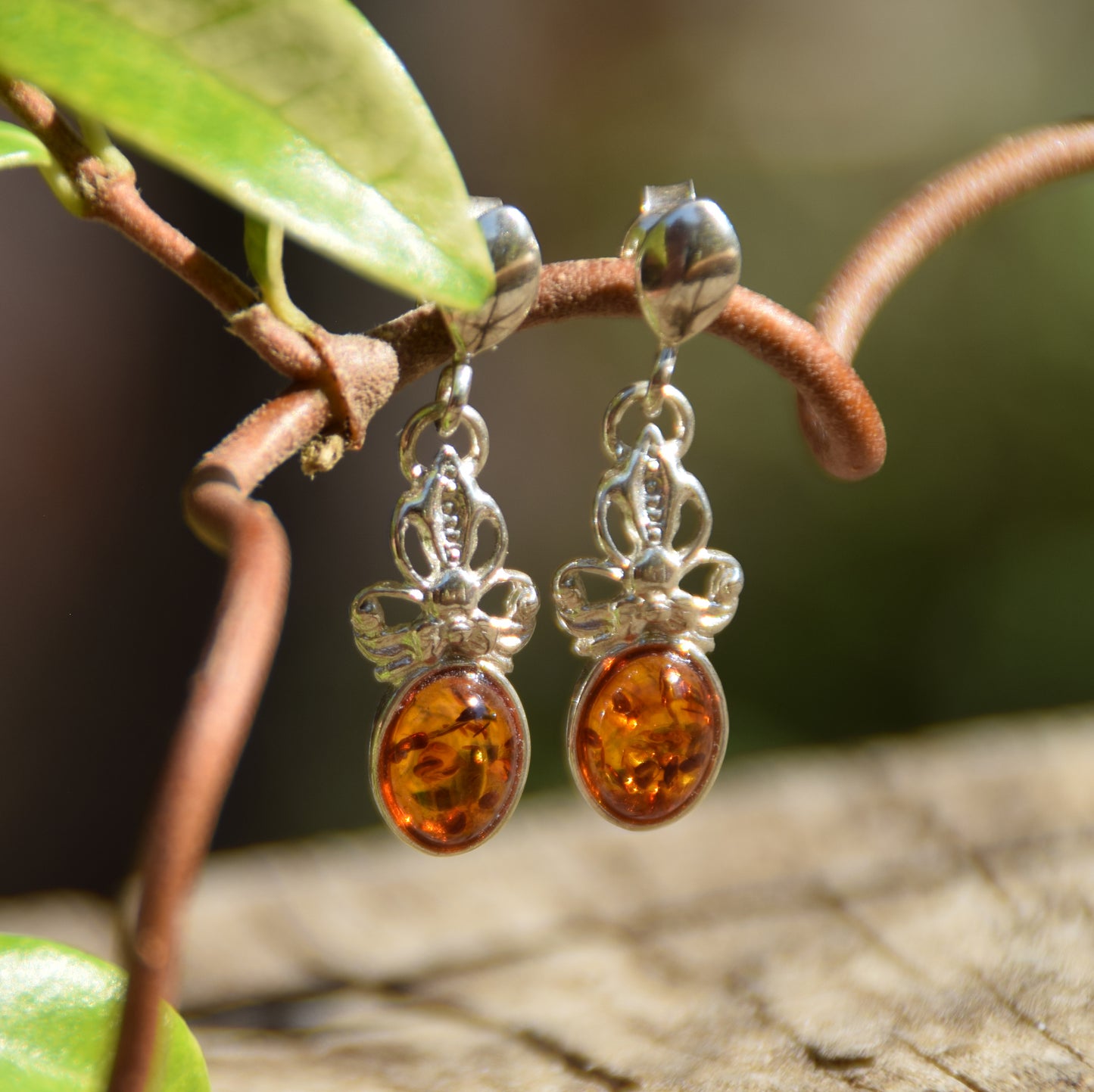 Delicate bow earrings made with cognac-colored natural Amber and 925 Sterling Silver, MJ Baltica, BK170