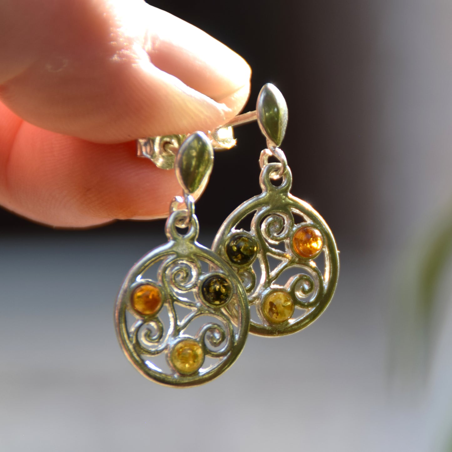 Dangle earrings with triskelion symbol made with natural Amber of various shades and 925 Sterling Silver, MJ Baltica, BK171