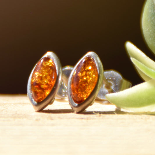 Delicate stud earrings created in an essential style with natural cognac amber and 925 sterling silver, MJ Baltica, BK181