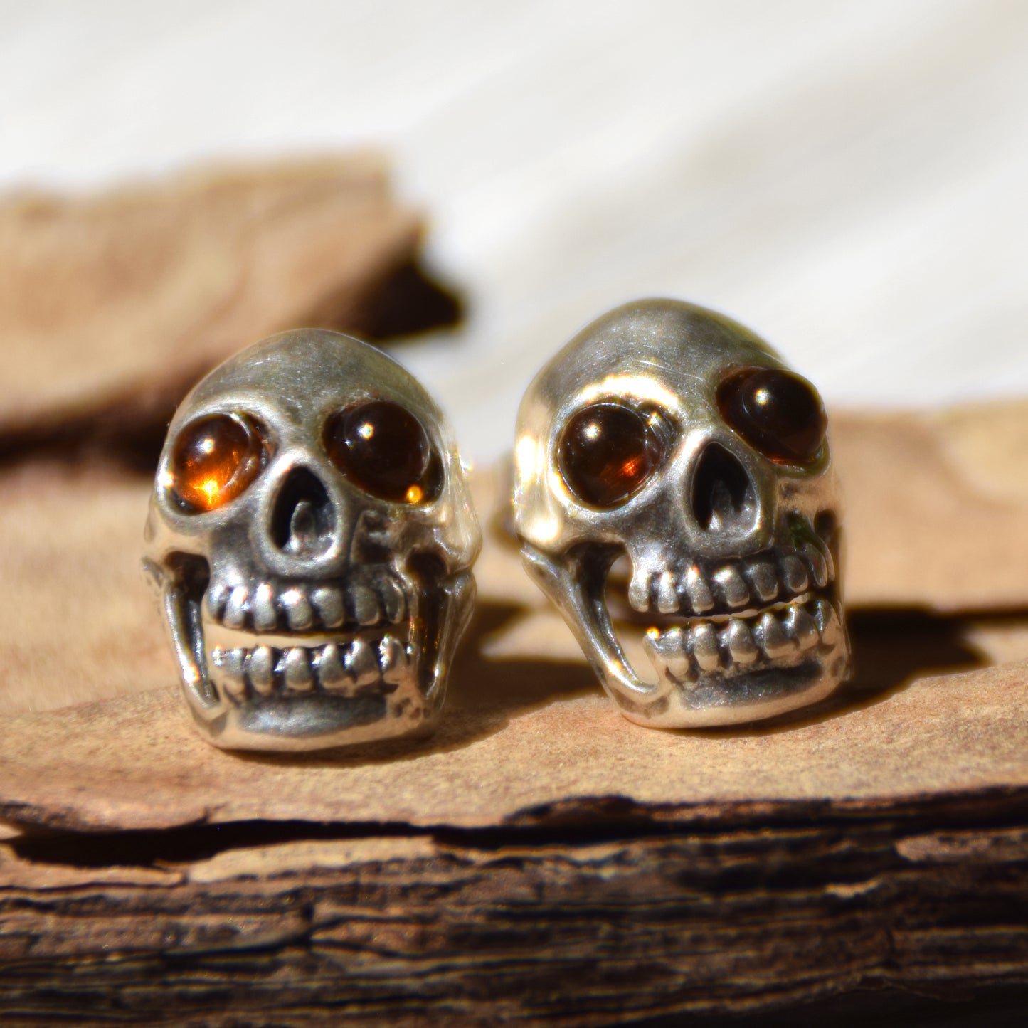 Earrings with a skull with natural cognac-colored Amber eyes and 925 Silver, MJ Baltica, BK183