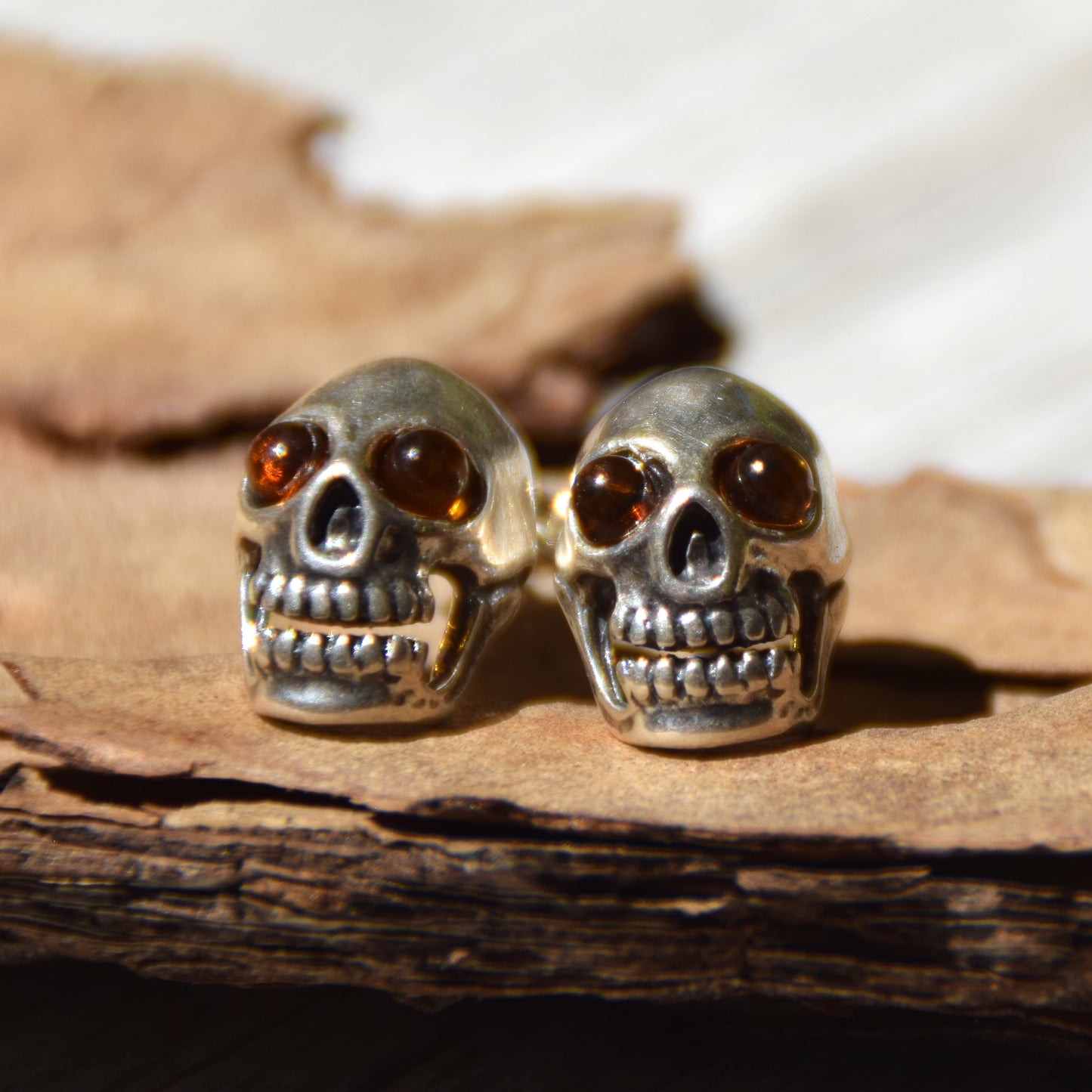 Earrings with a skull with natural cognac-colored Amber eyes and 925 Silver, MJ Baltica, BK183