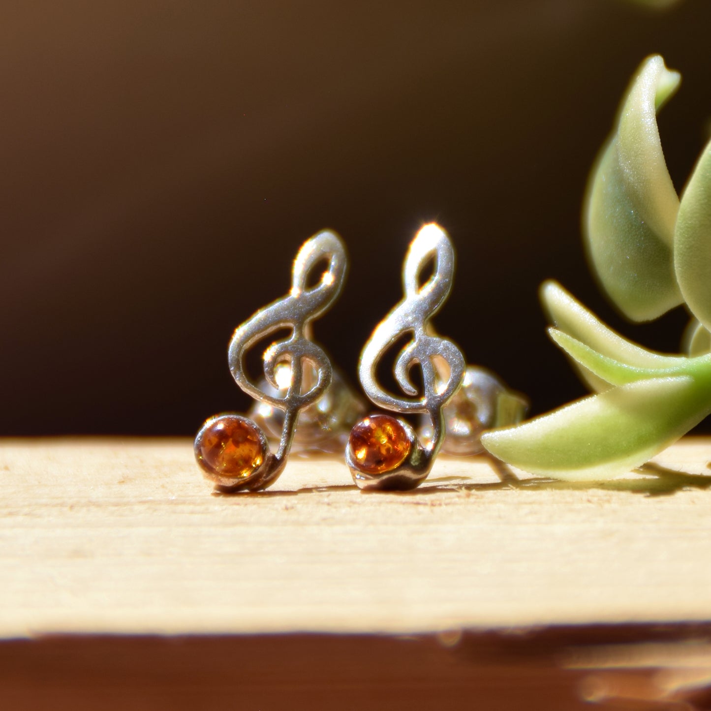 Delicate stud earrings with a musical note in natural cognac amber and 925 Silver, MJ Baltica, BK191