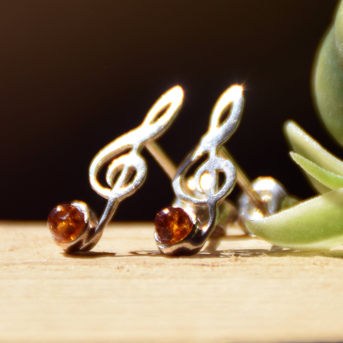 Delicate stud earrings with a musical note in natural cognac amber and 925 Silver, MJ Baltica, BK191