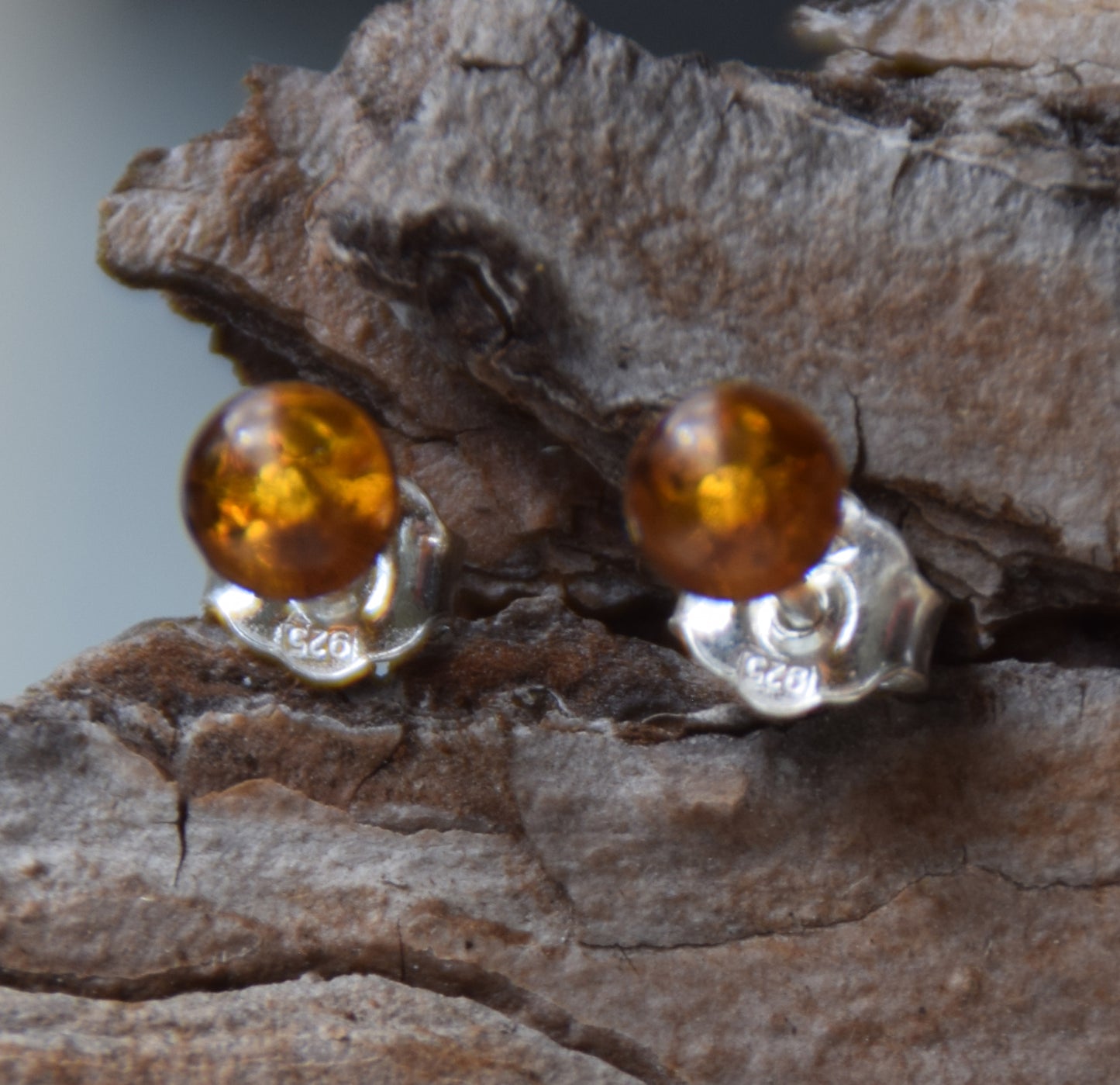 Essential earrings created with natural cognac-colored Amber spheres and 925 Silver, MJ Baltica, BK234