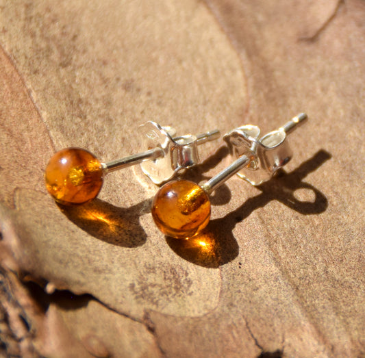 Essential earrings created with natural cognac-colored Amber spheres and 925 Silver, MJ Baltica, BK234