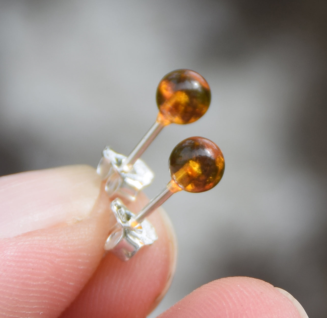 Essential earrings created with natural cognac-colored Amber spheres and 925 Silver, MJ Baltica, BK234