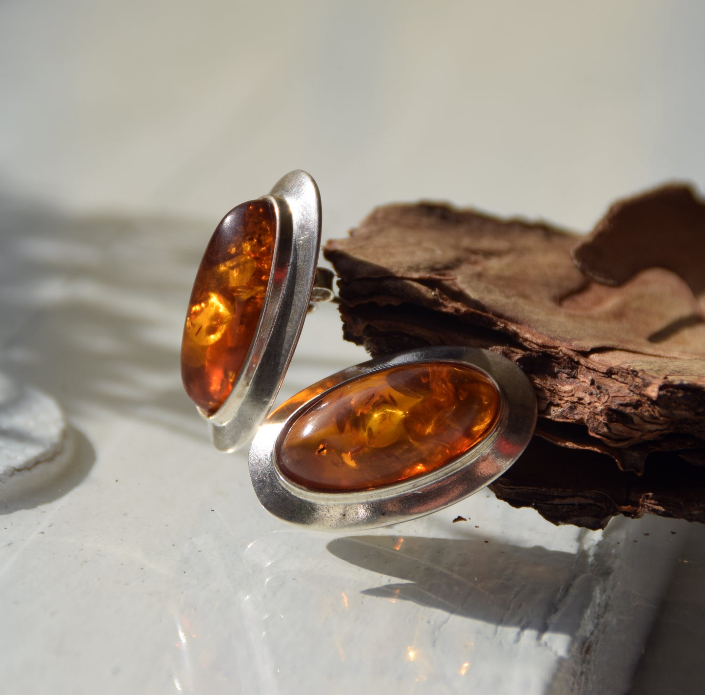 Large oval stud earrings with natural cognac amber and set in 925 Sterling Silver, MJ Baltica, BK247