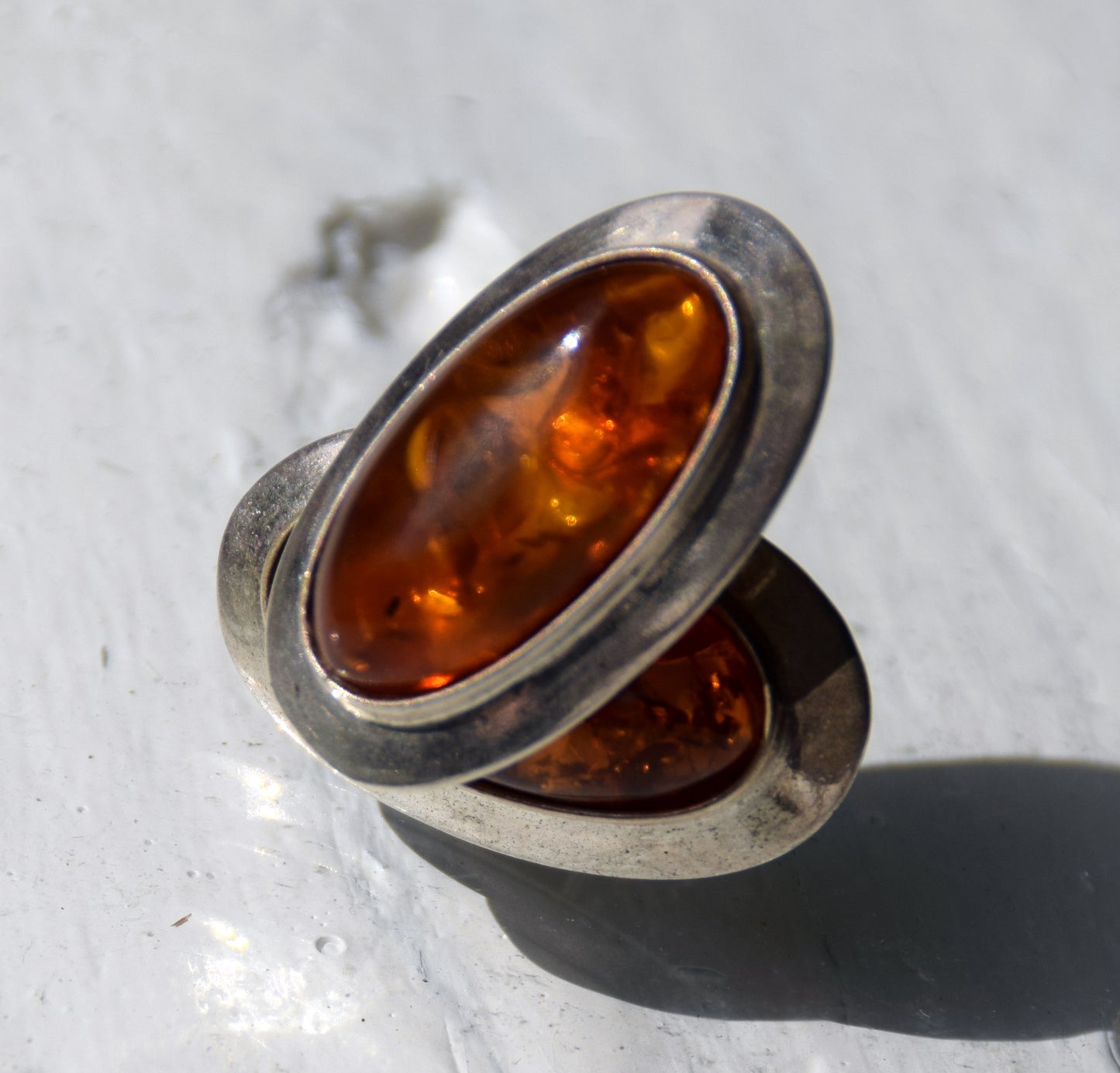 Large oval stud earrings with natural cognac amber and set in 925 Sterling Silver, MJ Baltica, BK247