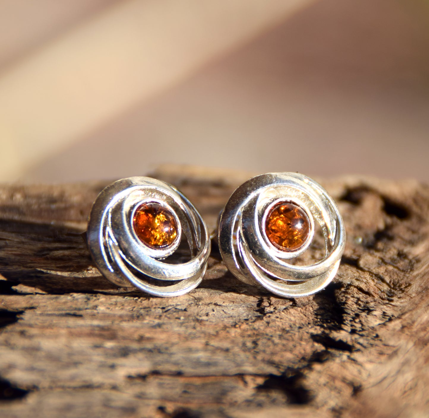 Shiny round earrings made of natural cognac-colored Amber and Sterling Silver 925, MJ Baltica, BK238