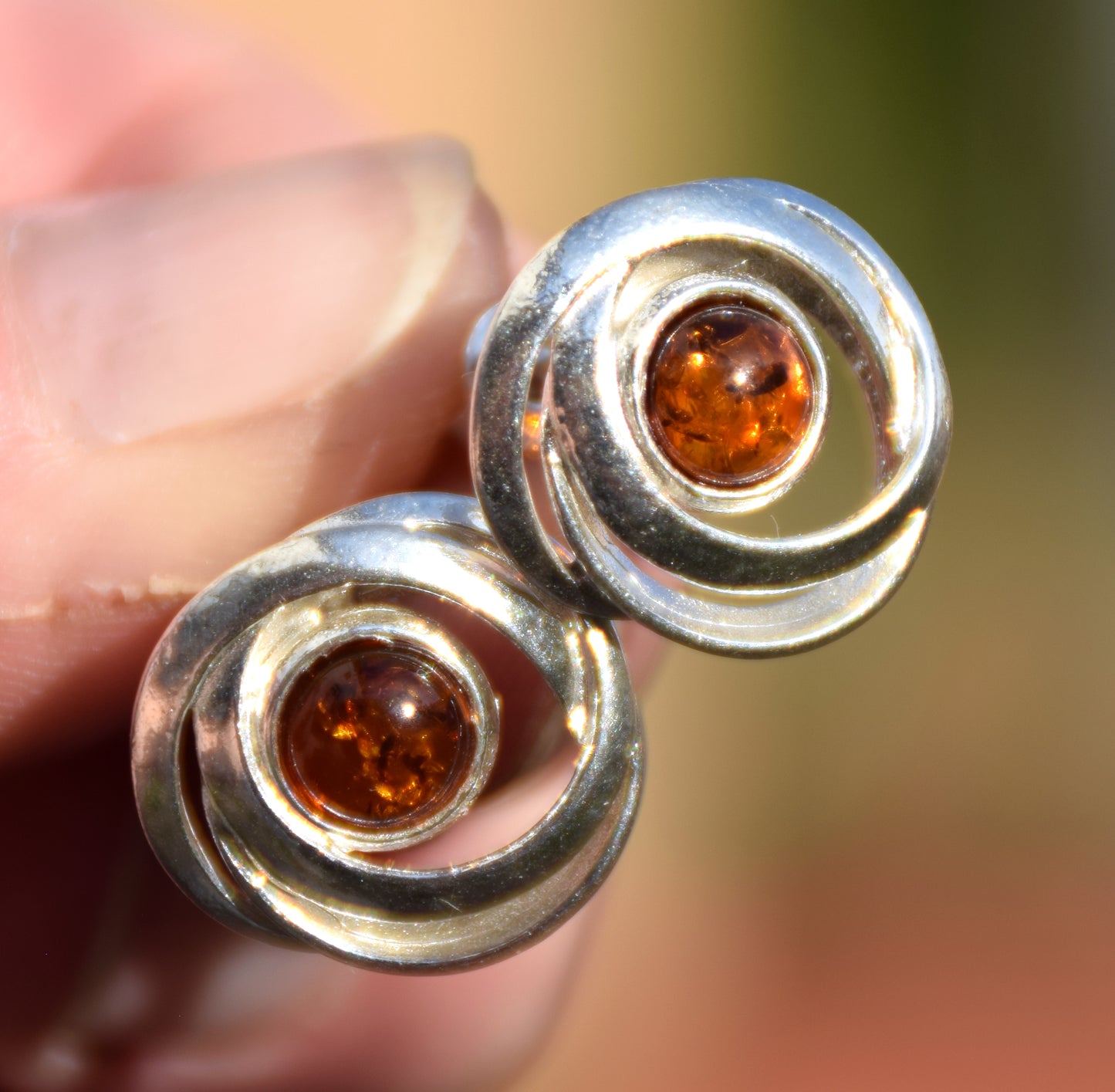 Shiny round earrings made of natural cognac-colored Amber and Sterling Silver 925, MJ Baltica, BK238