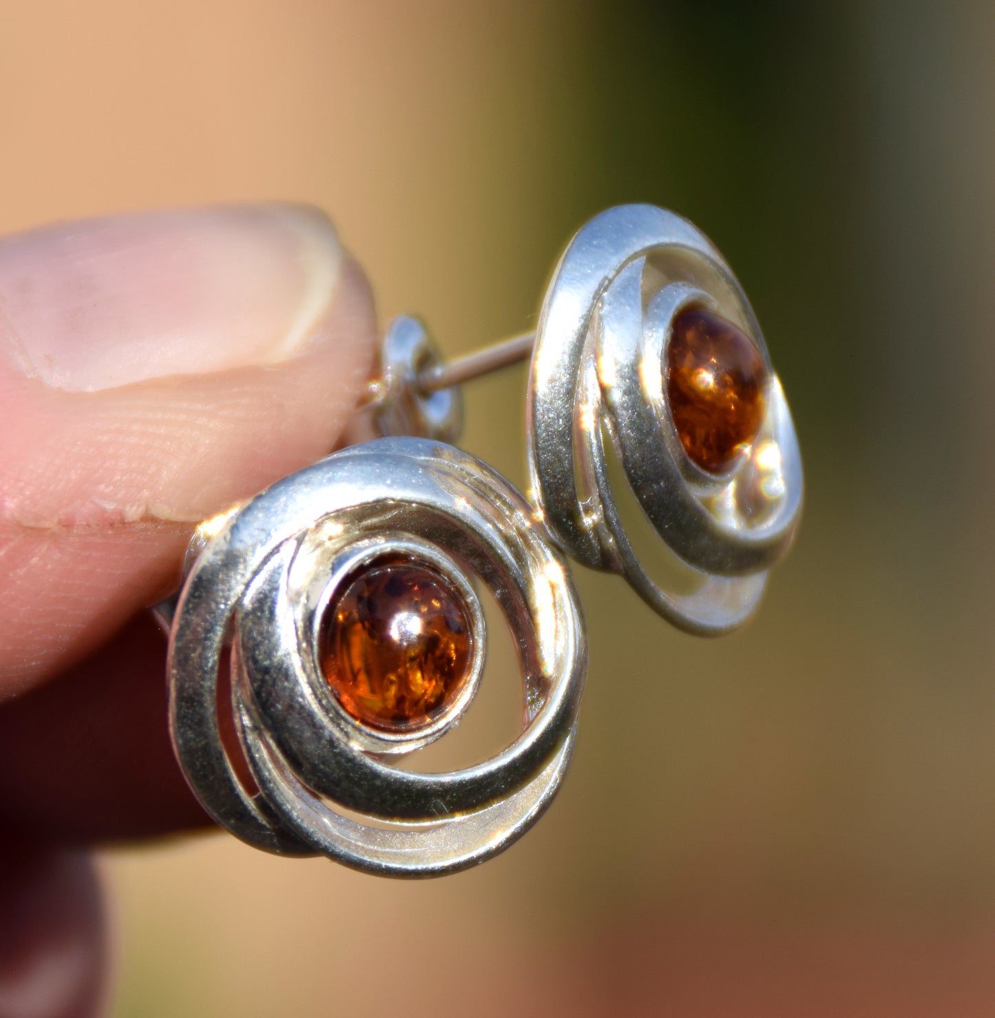 Shiny round earrings made of natural cognac-colored Amber and Sterling Silver 925, MJ Baltica, BK238