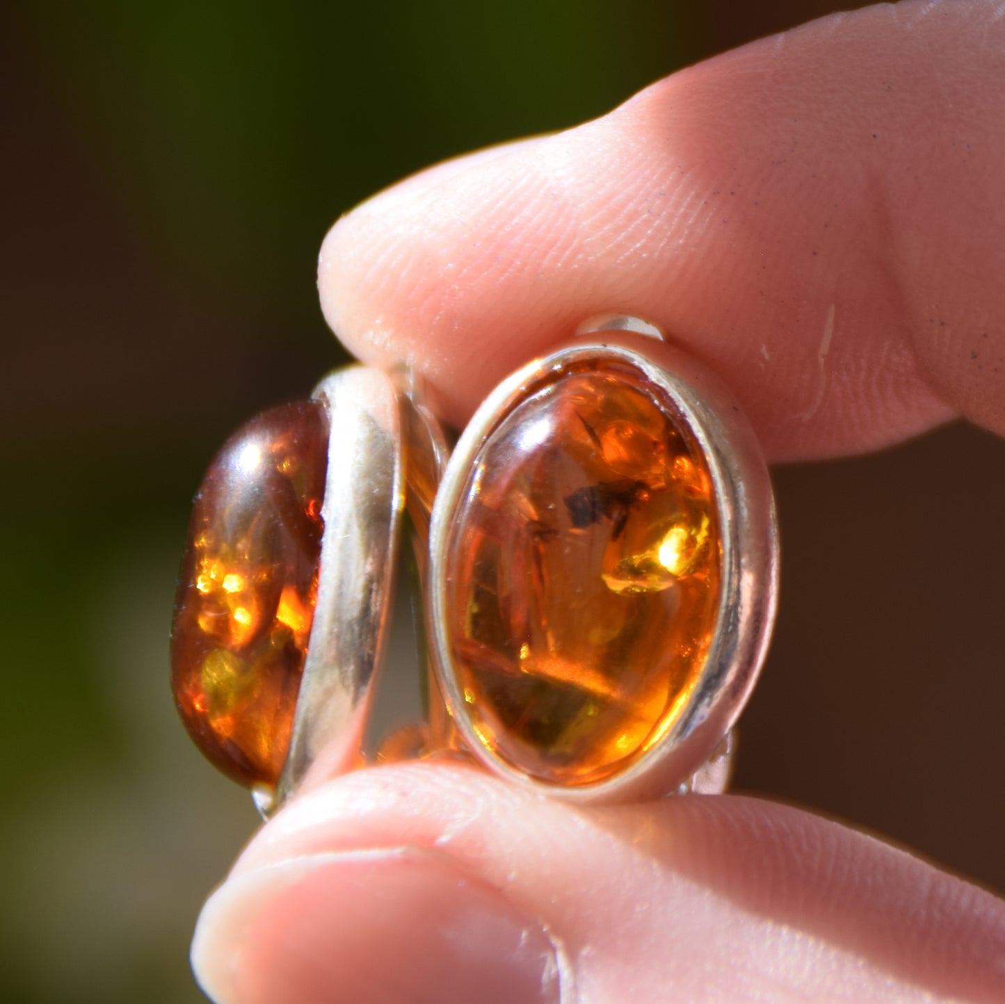 Oval clip-on earrings with natural cognac amber and 925 sterling silver, MJ Baltica, BKK005
