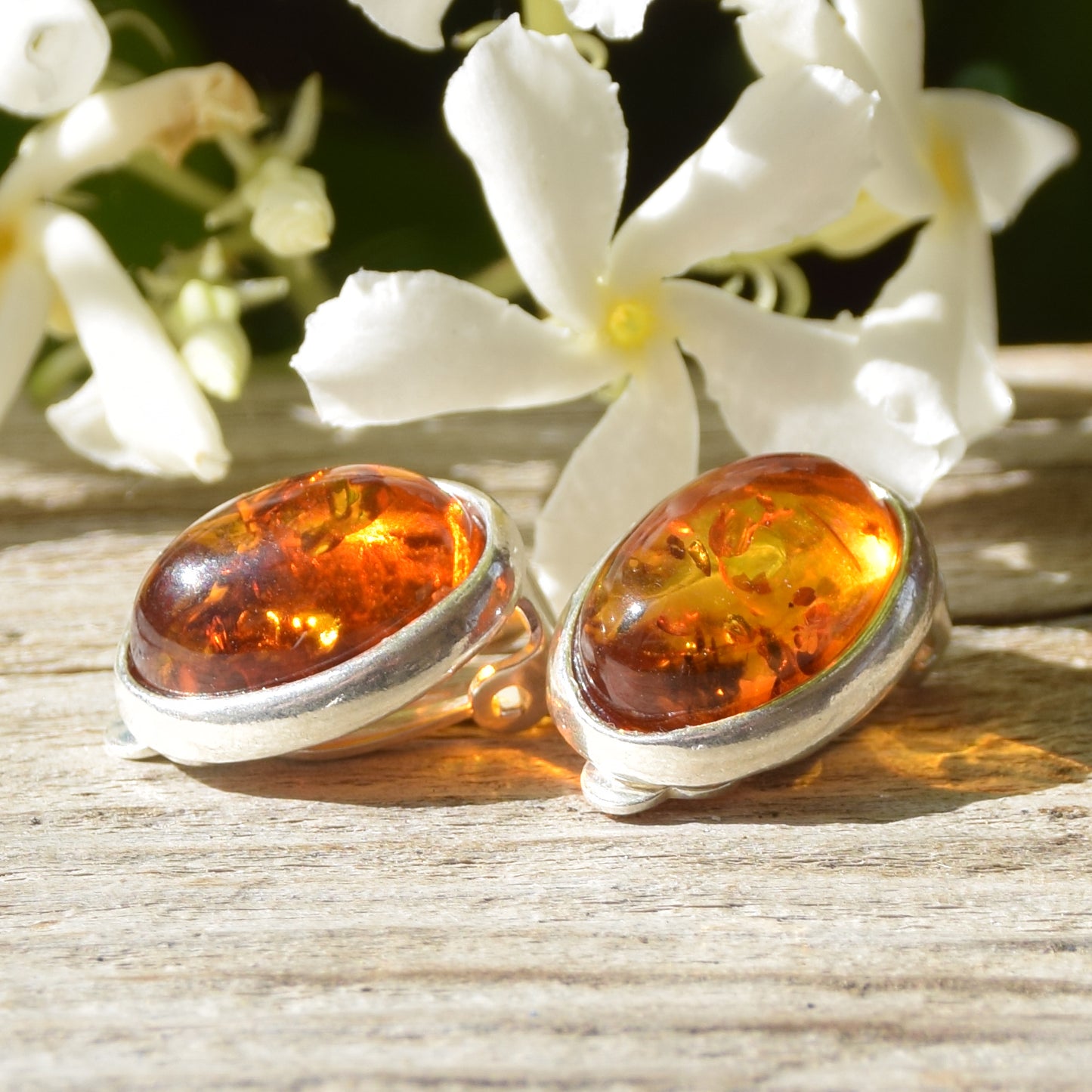 Oval clip-on earrings with natural cognac amber and 925 sterling silver, MJ Baltica, BKK005