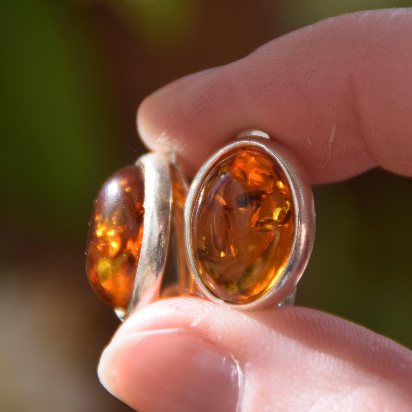 Oval clip-on earrings with natural cognac amber and 925 sterling silver, MJ Baltica, BKK005